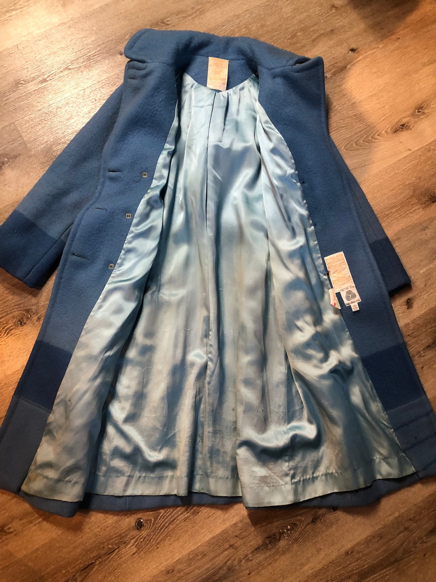 Hudson’s Bay Company Blue 100% virgin wool point blanket coat in a double breasted swing coat style with belt, detachable hood, button closures, slash pockets and satin lining. Made in Canada. Size small - Kingspier Vintage