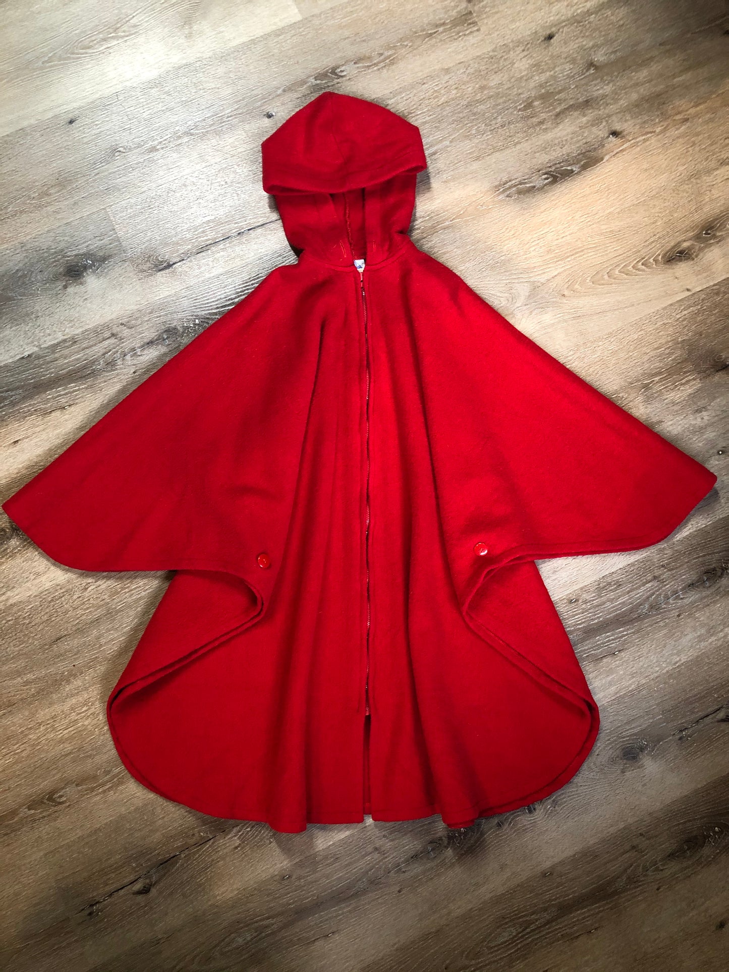 Kingspier Vintage - My Maine Bag bright red wool cape with hood, zipper closure and buttons at the sides to create sleeves. Made in Bangor, Maine, USA. One size fits most.