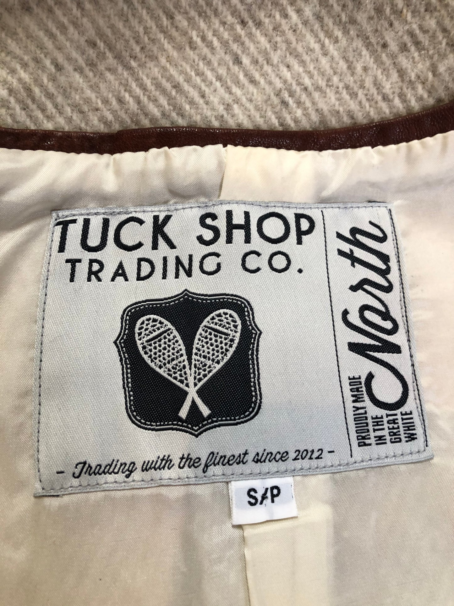 Kingspier Vintage - Tuck Shop Trading Co Dreamy Cape. Made in Canada with high quality wool from the Woolrich Mill, leather trim, round brass buttons and full lining. Size small.