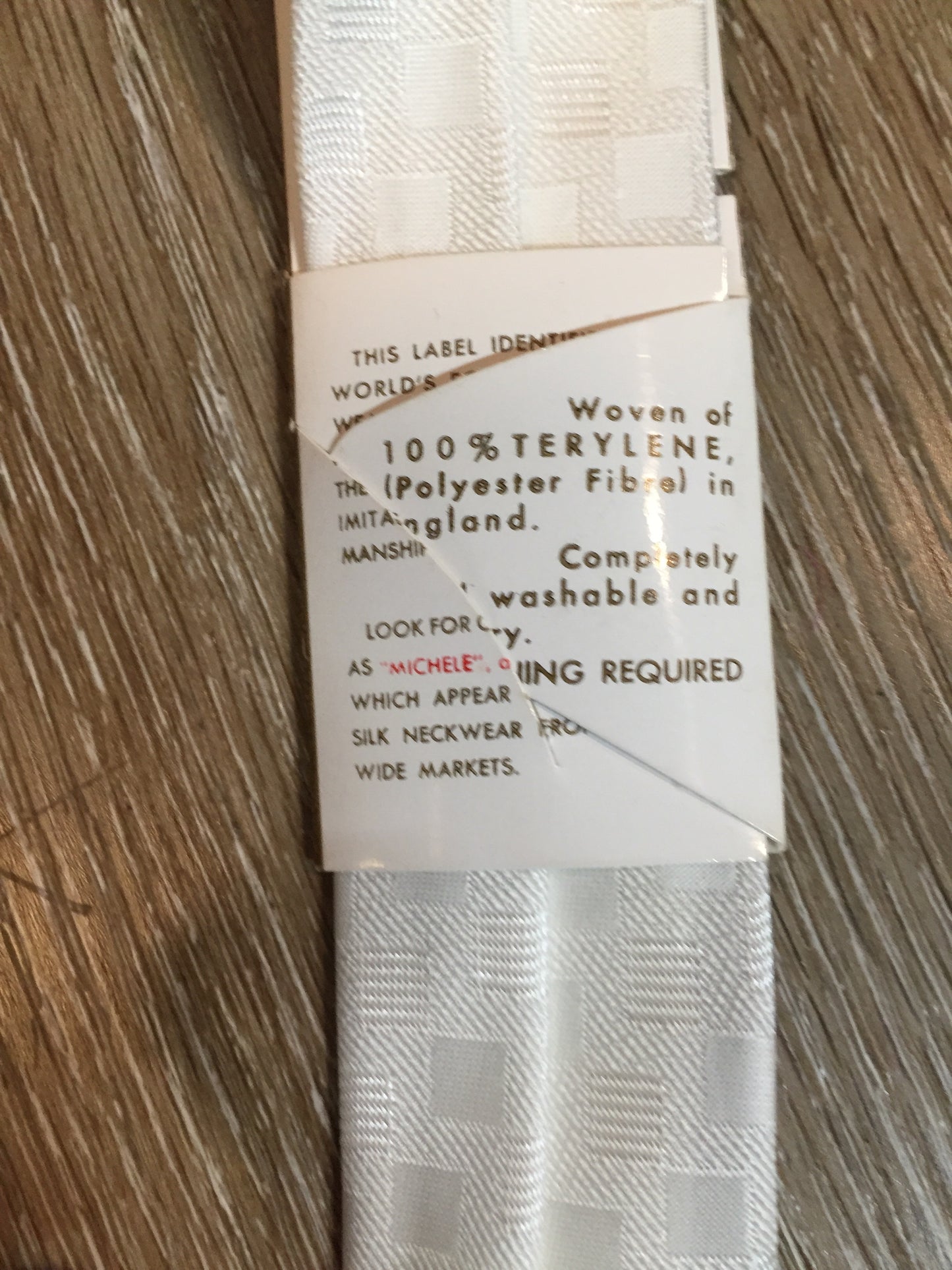 Kingspier Vintage - Park Lane of Canada “Terylene” (polyester fibre) white check tie.
Length: 52.5”
Width: 2.25”
This tie is in excellent condition.