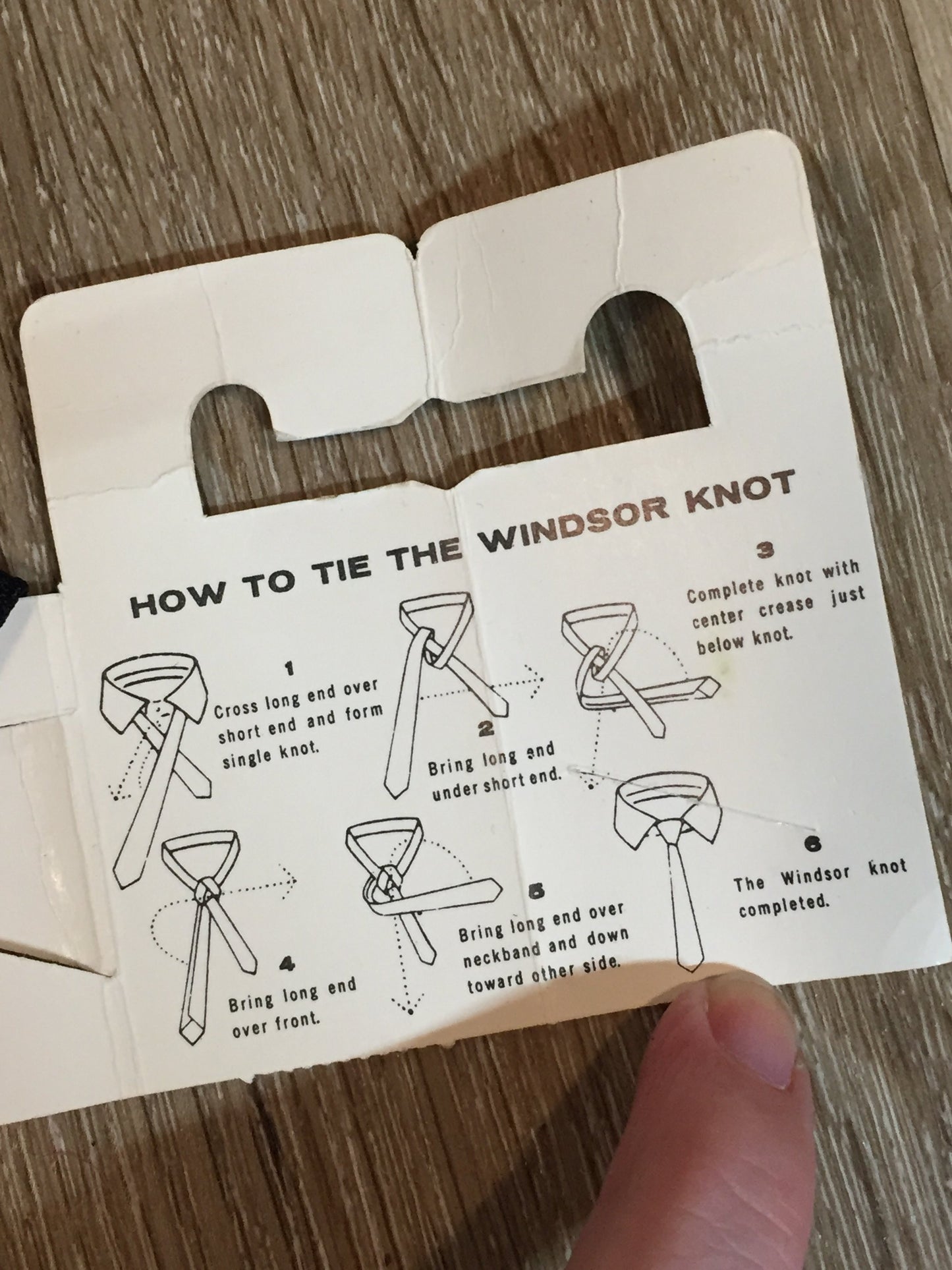 Kingspier Vintage - Gentry tie in black with red, white, yellow diamond motif. Fibres unknown.
Length: 52”
Width: 2.25” 
This tie is in excellent condition.