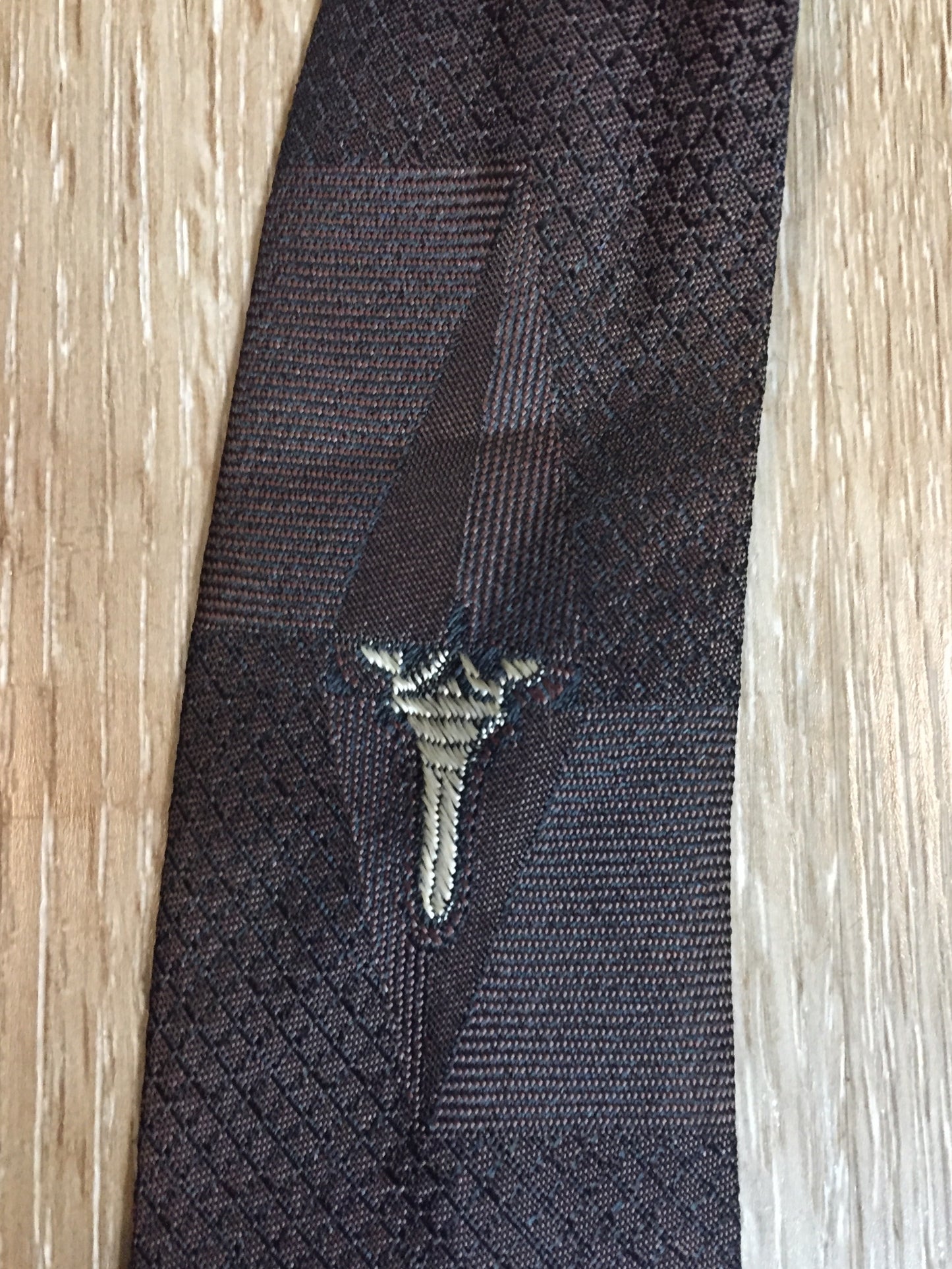 Kingspier Vintage - A Todd by Abbey tie with brown and black design. Fibres unknown.
Length: 56”
Width: 2.5”
This tie is in excellent condition.