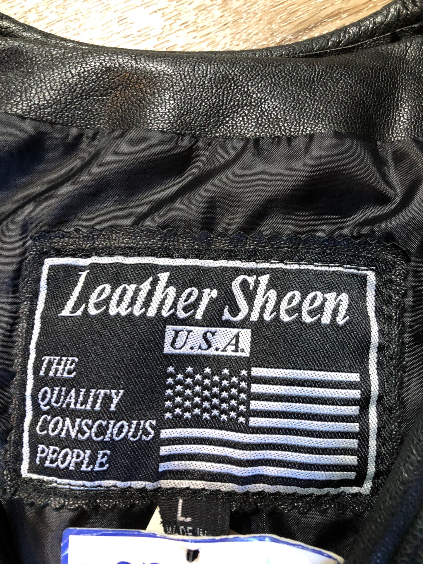 Kingspier Vintage - Sheen black leather jacket with fringe and beaded detail. Made in the USA. Size large.