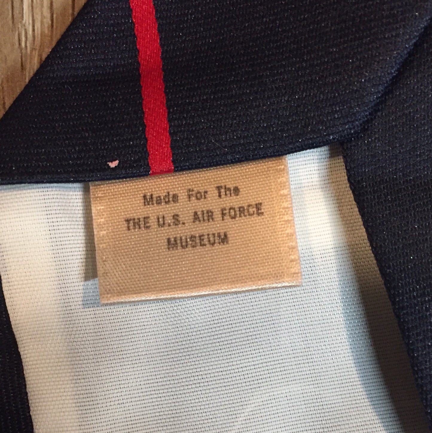 Kingspier Vintage - Prince Consort 100% polyester tie in navy with white and red stripes and a small jet illustration at the bottom center of the tie. Made for the U.S. airforce.
 
Length: 58.25” 
Width: 3” 
This tie is in excellent condition.