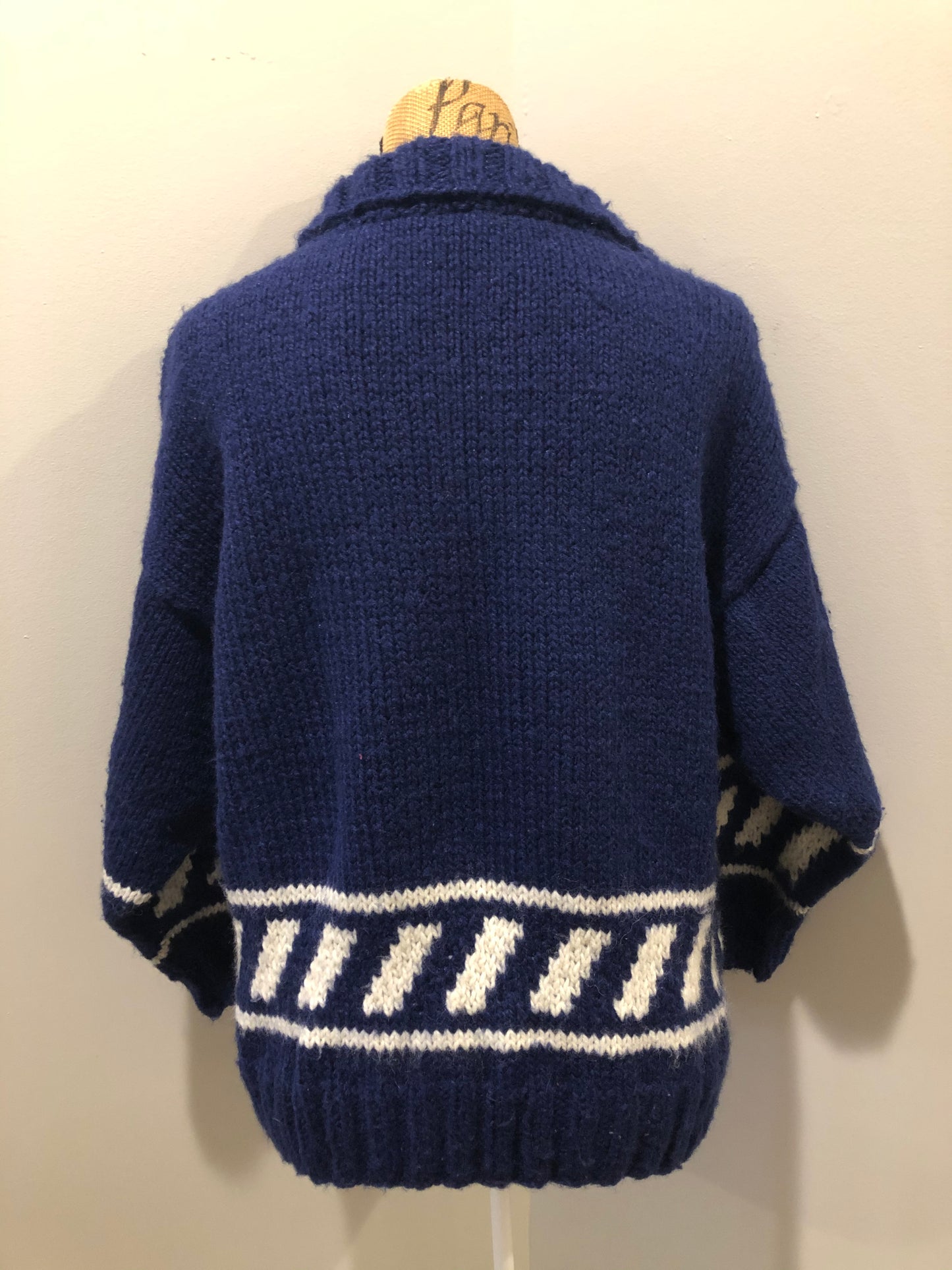 Kingspier Vintage - Hand knit royal blue cardigan with white design, collar and button closures. Made in Nova Scotia, Canada. Size large.