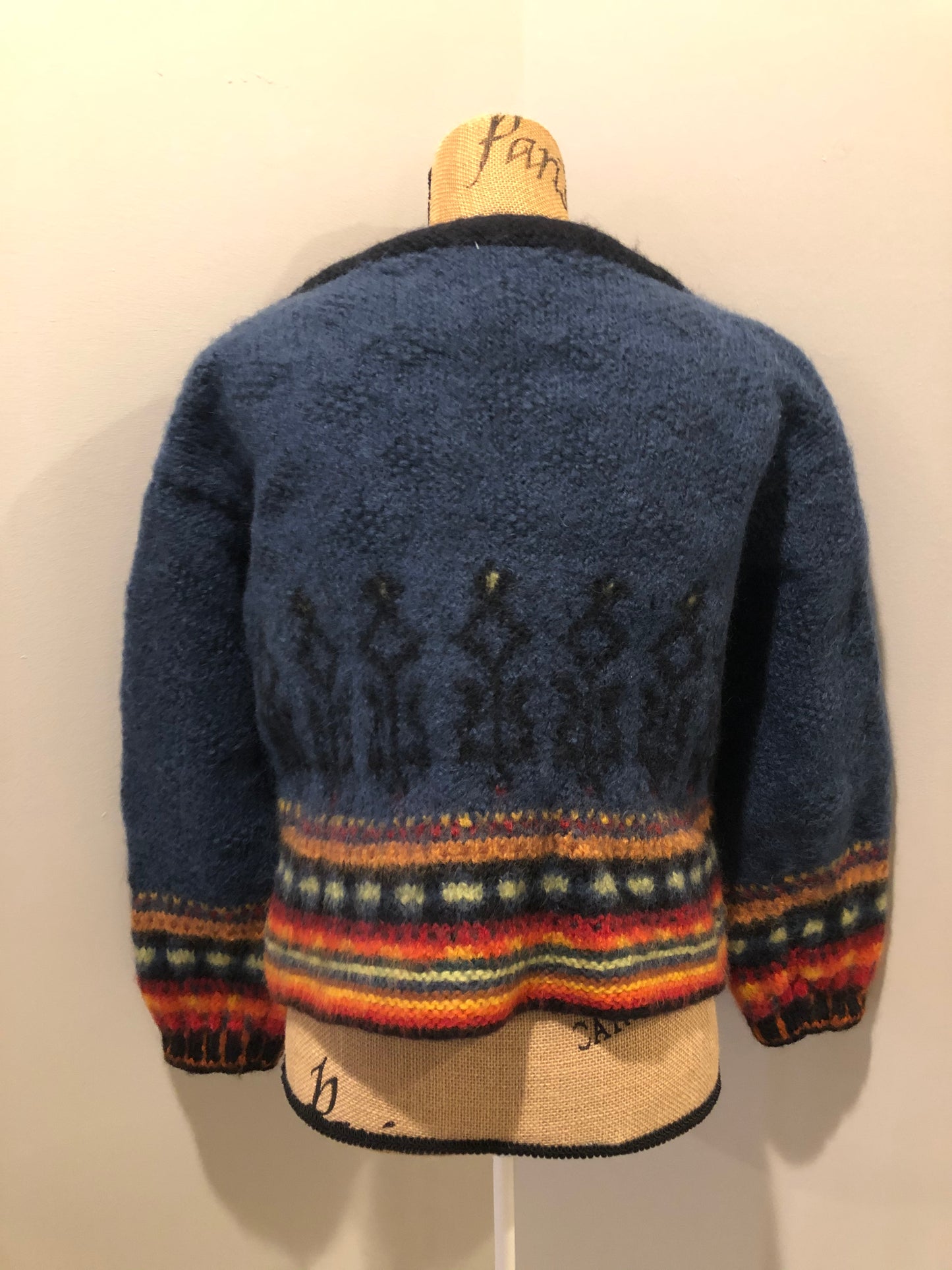 Kingspier Vintage - Emma “Kalveness Designs Ltd.” felted wool cardigan in navy blue with multi-coloured designs and silver button closures. Made in Canada. Size Small, medium.