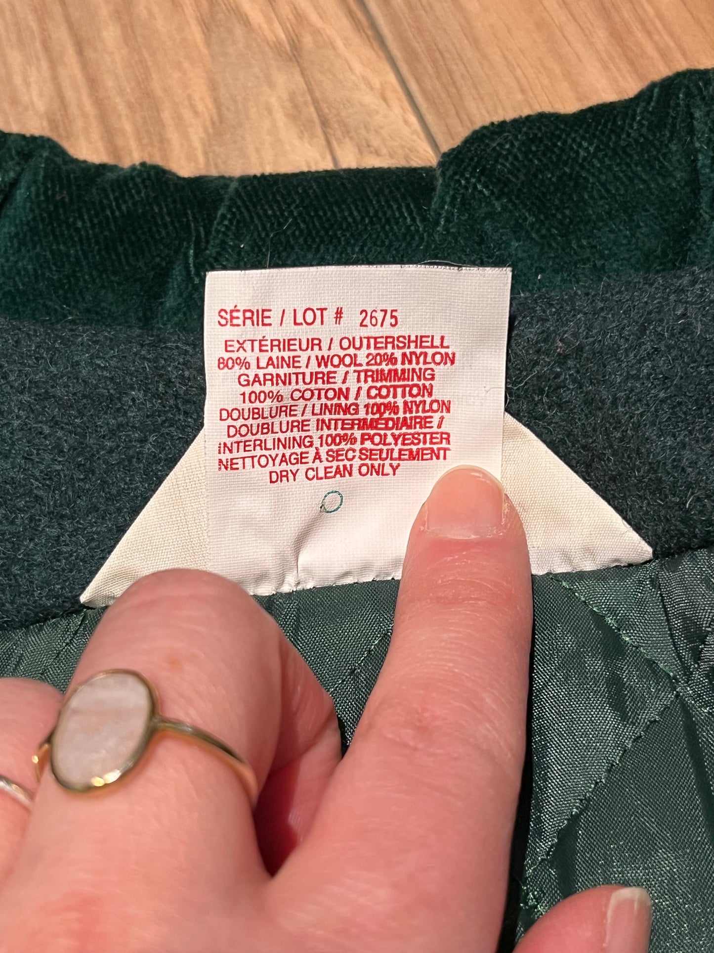 Vintage Coquette dark green wool/ nylon blend coat with button closures, two front pockets, quilted lining, velvet trim and a bow detail in the back.
Made in Canada
Size 14/ Chest 42”
