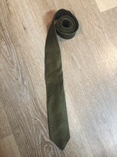 Load image into Gallery viewer, Kingspier Vintage - Goodsons Inc. 100% silk olive green tie.

Length: 55.5” 
Width: 2” 

This tie is in excellent condition.
