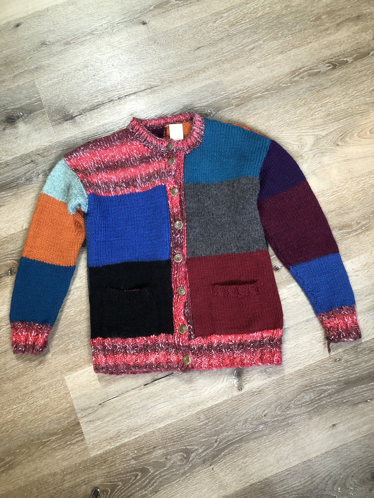 Kingspier Vintage - Hand knit Multi-Coloured patch work cardigan with button closures and pockets Made in Nova Scotia, Canada. Fibres unknown