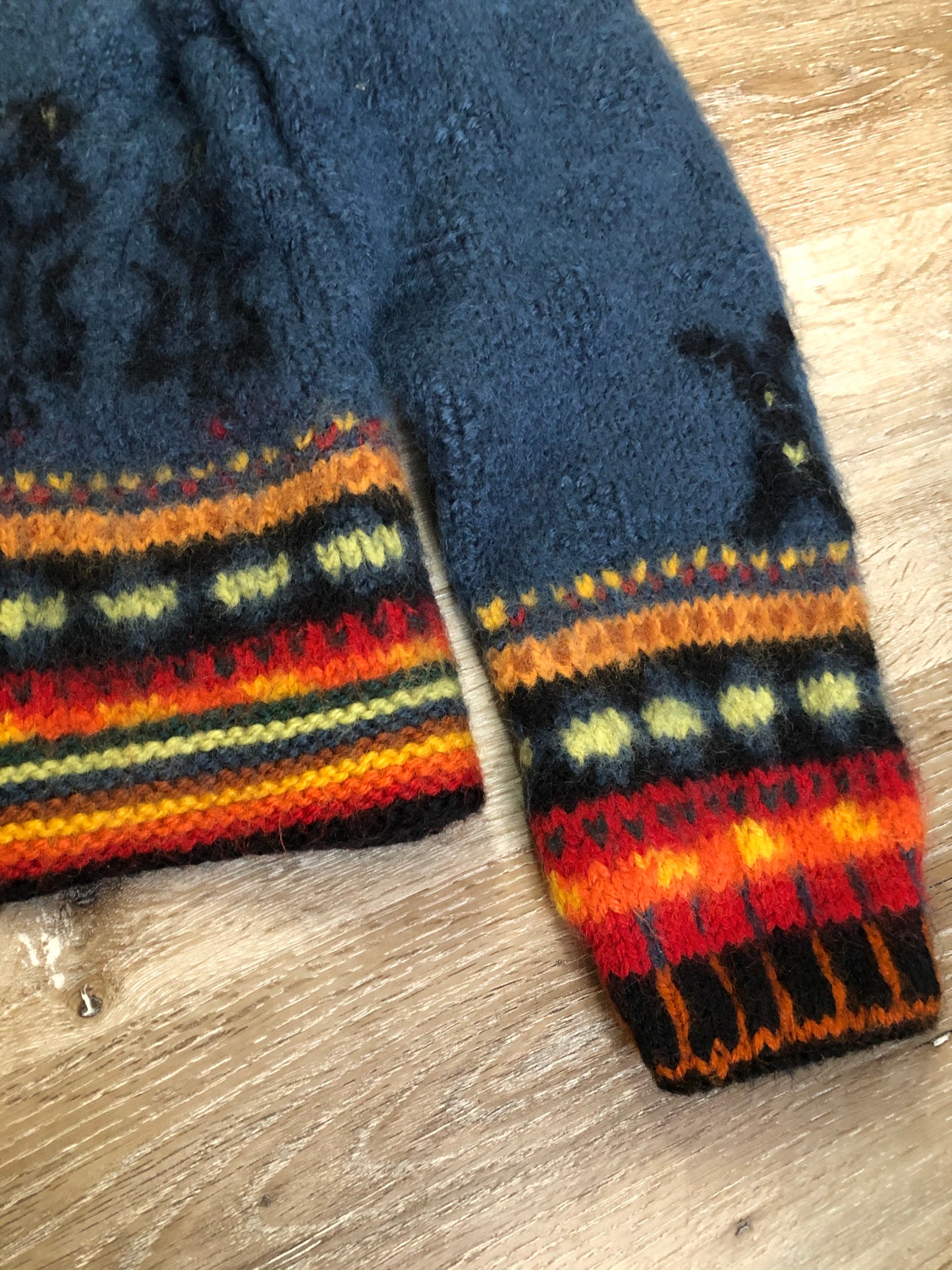 Kingspier Vintage - Emma “Kalveness Designs Ltd.” felted wool cardigan in navy blue with multi-coloured designs and silver button closures. Made in Canada. Size Small, medium.