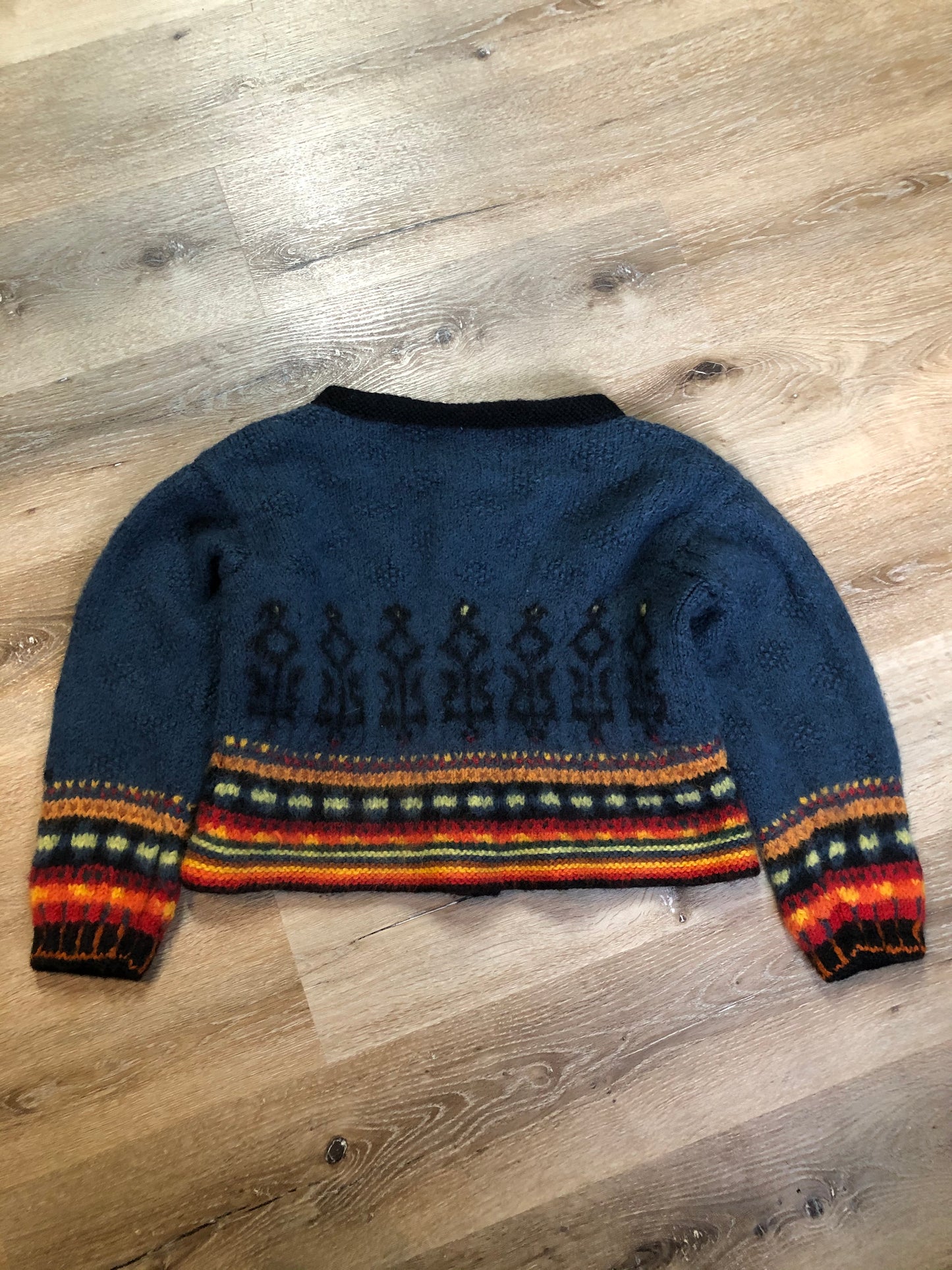 Kingspier Vintage - Emma “Kalveness Designs Ltd.” felted wool cardigan in navy blue with multi-coloured designs and silver button closures. Made in Canada. Size Small, medium.