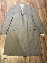 Load image into Gallery viewer, Vintage E. Braun and Co. grey wool and silk blend coat with button closures and two front flap pockets.

Made in Baden-Baden W. Germany 
Chest 44”
