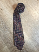 Load image into Gallery viewer, Kingspier Vintage - Currie “Authentic Ancient Persians” with navy, red and cream design. Fibres unknown but feels like sIlk.

Length: 51.5” 
Width: 3” 

This tie is in great condition with some minor wear.
