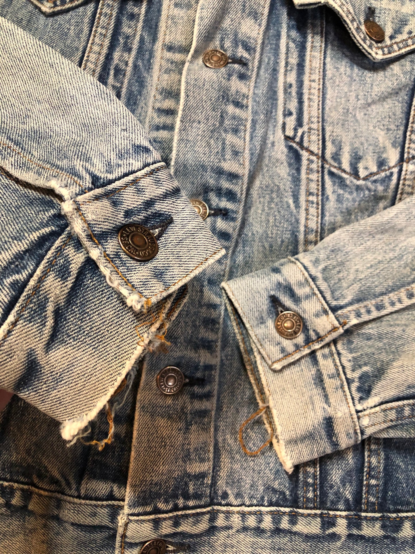 Vintage 1970’s Levi’s light wash denim trucker jacket with two flap pockets on the chest. Red Tab, 100% cotton, made in Canada, size 38 - Kingspier Vintage