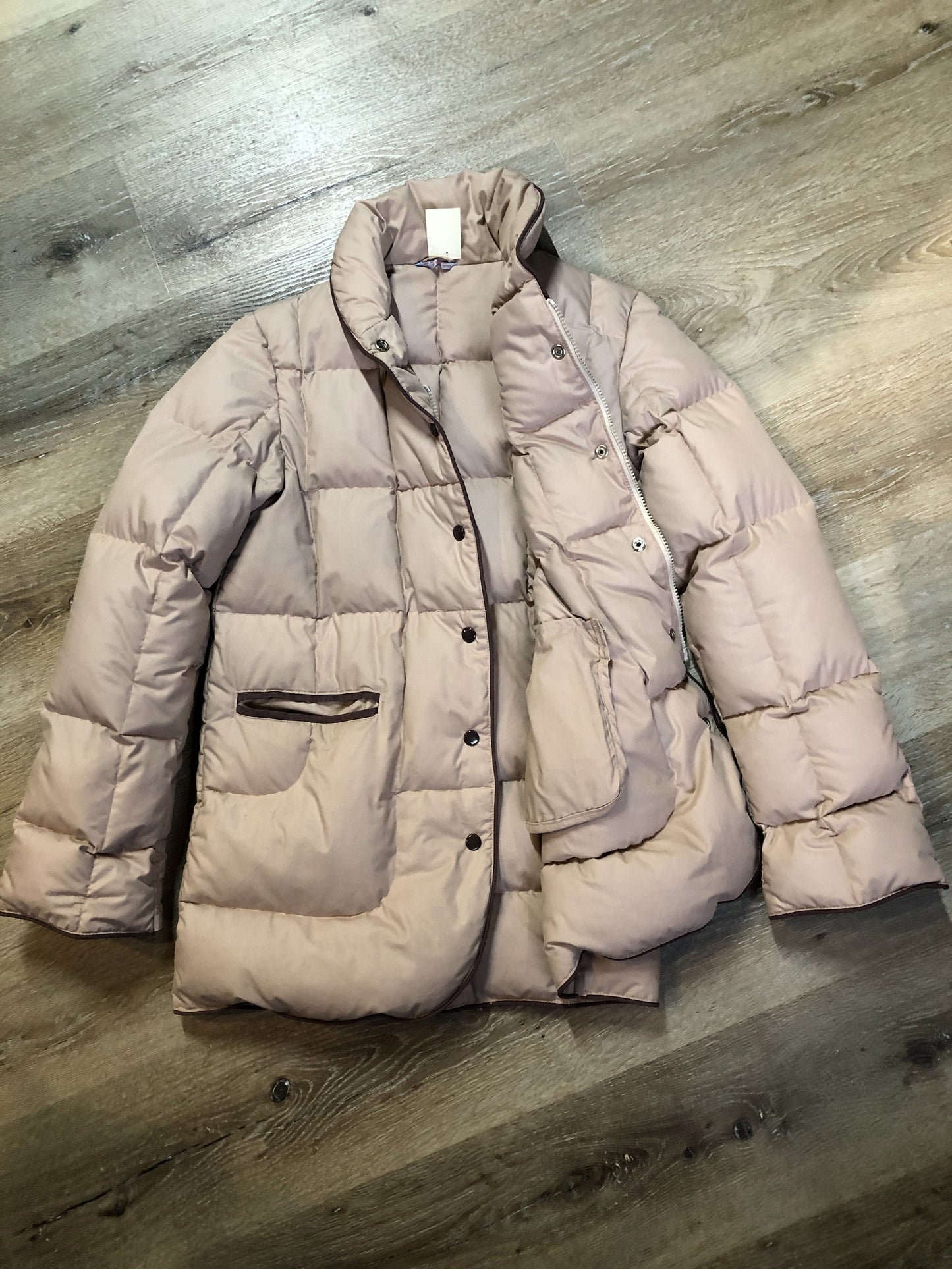 Kingspier Vintage - Vintage light pink down-filled puffer jacket with brown piping detail, snap closures, zipper closures and two welt pockets. Size 8.