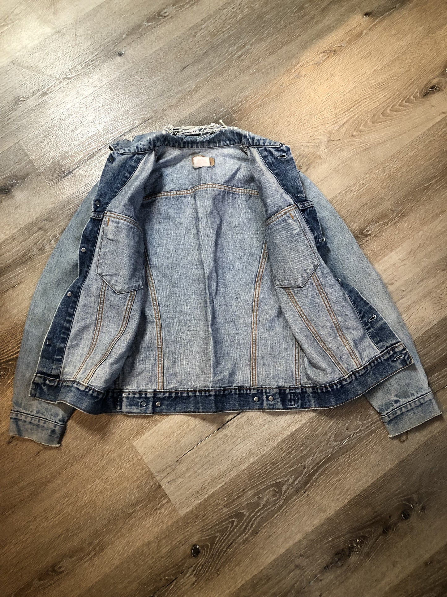 Vintage 1970’s Levi’s light wash denim trucker jacket with two flap pockets on the chest. Red Tab, 100% cotton, made in Canada, size 38 - Kingspier Vintage