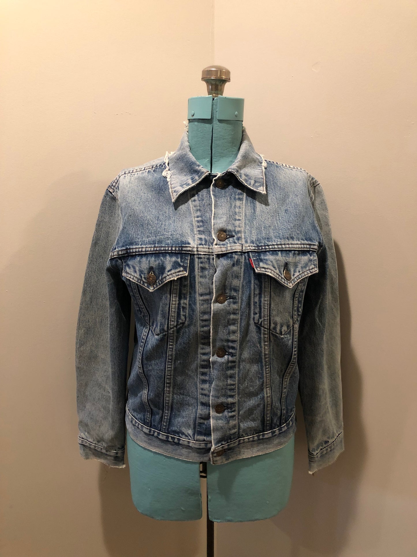 Vintage 1970’s Levi’s light wash denim trucker jacket with two flap pockets on the chest. Red Tab, 100% cotton, made in Canada, size 38 - Kingspier Vintage