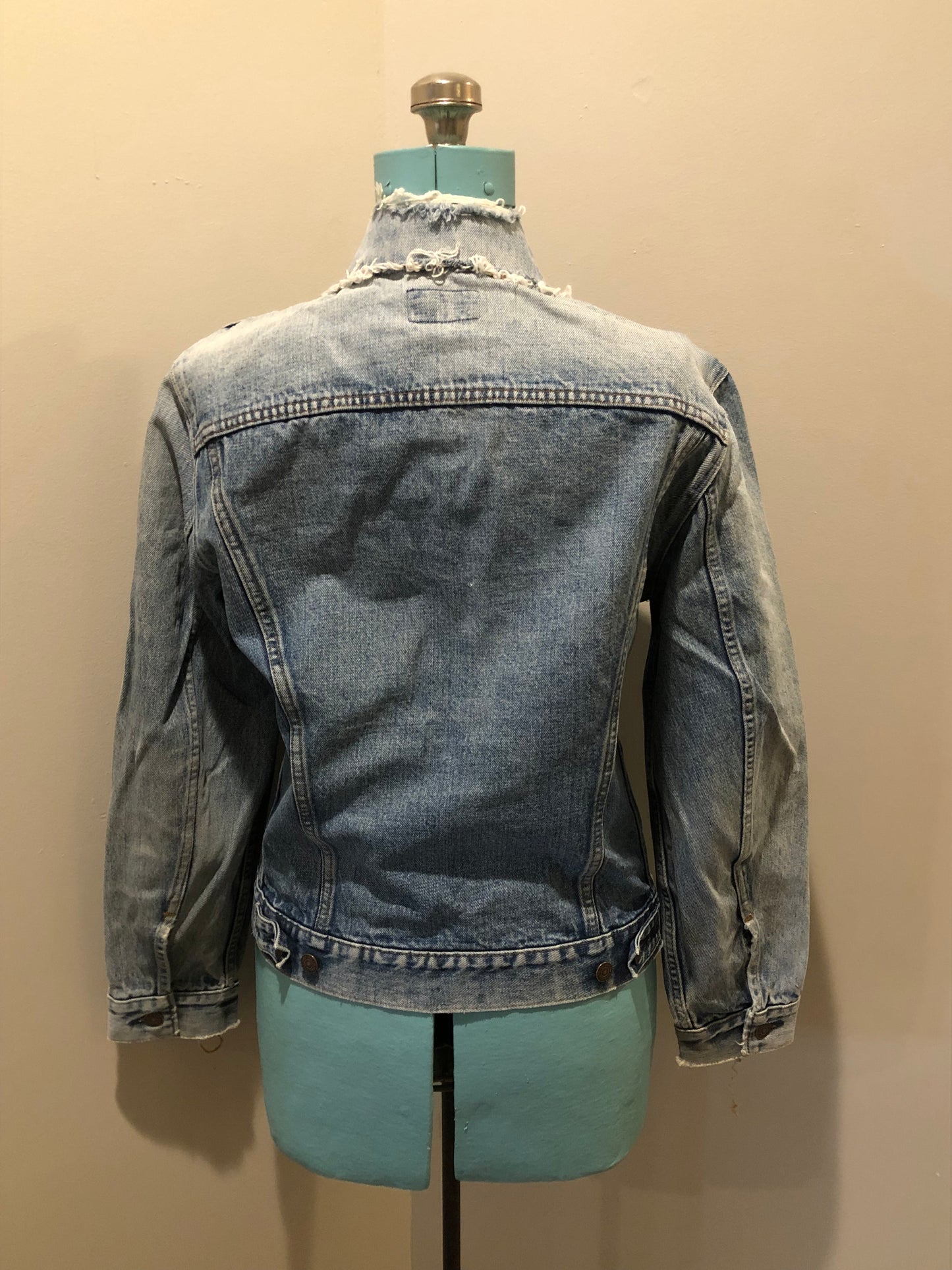 Vintage 1970’s Levi’s light wash denim trucker jacket with two flap pockets on the chest. Red Tab, 100% cotton, made in Canada, size 38 - Kingspier Vintage