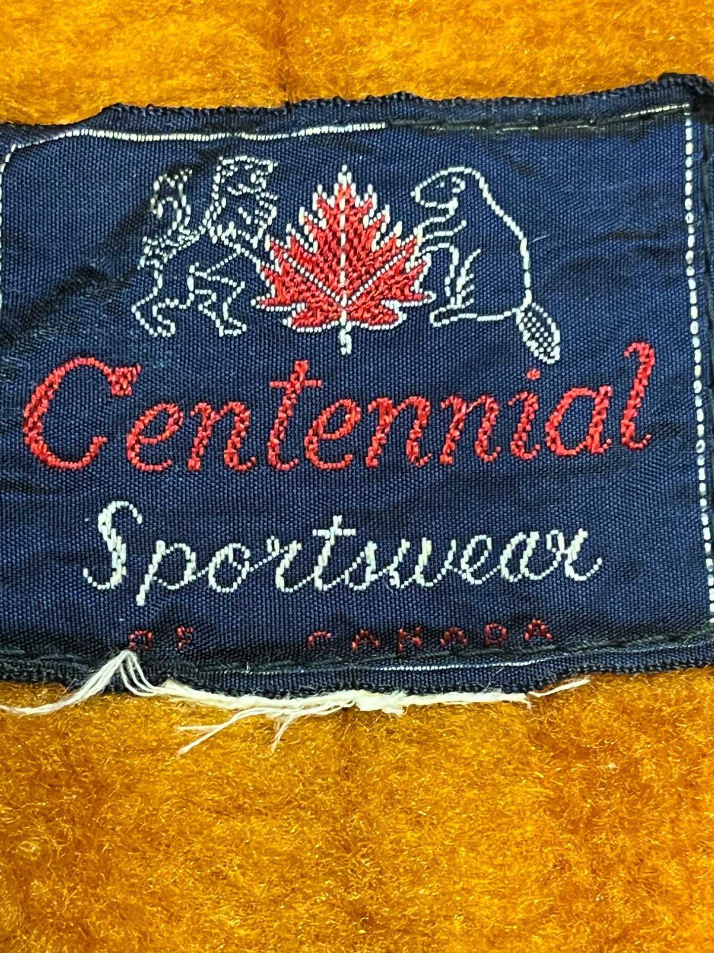 Vintage Centennial Sportswear toupe trench coat with removable orange lining, button closures and two front pockets.
Made in Canada
Chest 46”