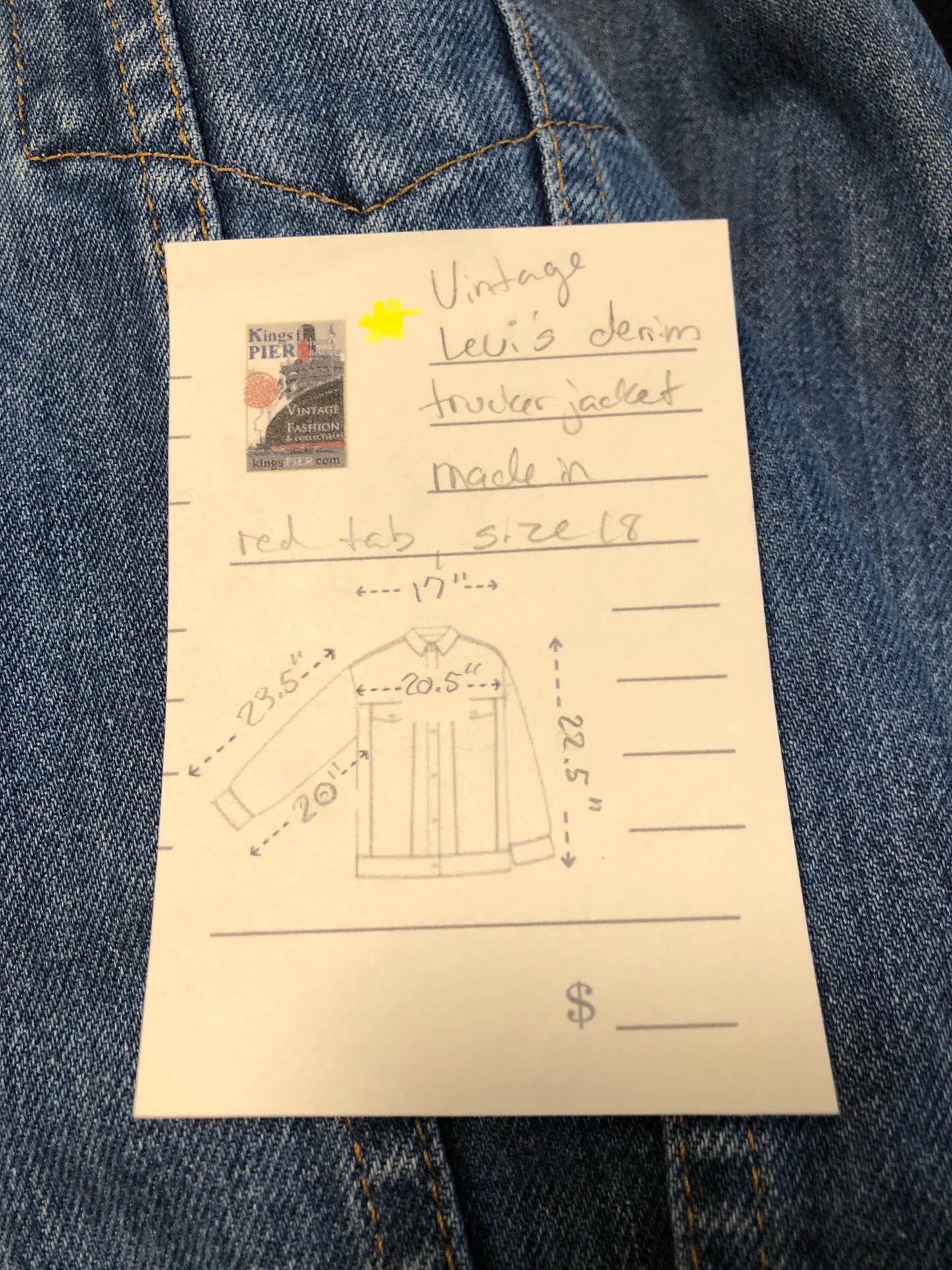 Vintage 1970’s Levi’s medium wash denim trucker jacket with button closures and two flap pockets on the chest. Red Tab, 100% cotton, made in USA, size 18 - Kingspier Vintage