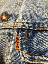 Load image into Gallery viewer, Vintage 1970’s Levi’s light wash denim trucker jacket with button closures and two flap pockets on the chest.  Orange Tab, 100% cotton, made in Canada, size 46 - Kingspier Vintage
