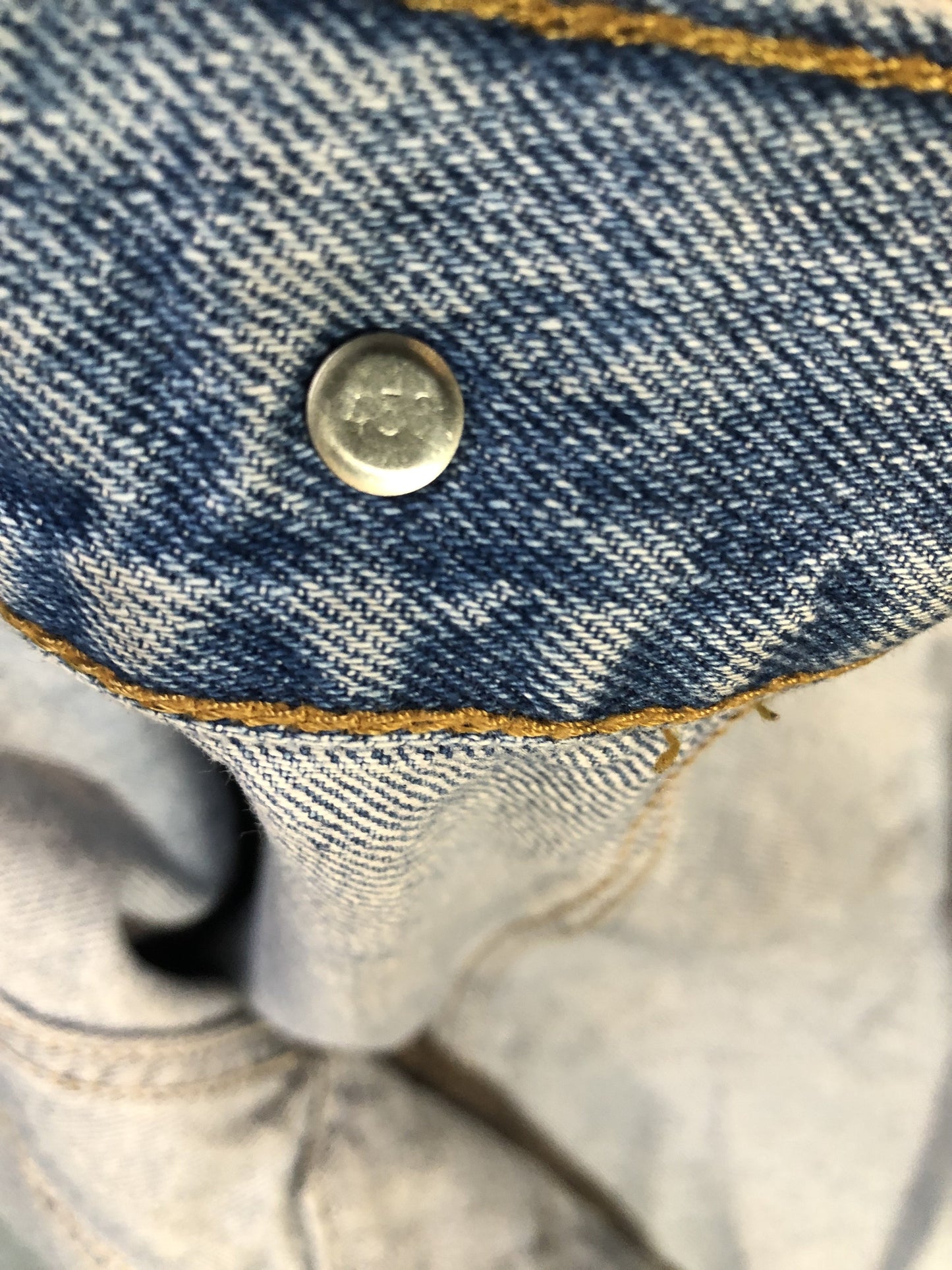 Vintage 1970’s Levi’s light wash denim trucker jacket with button closures and two flap pockets on the chest. Orange Tab, 100% cotton, made in Canada, size 46 - Kingspier Vintage