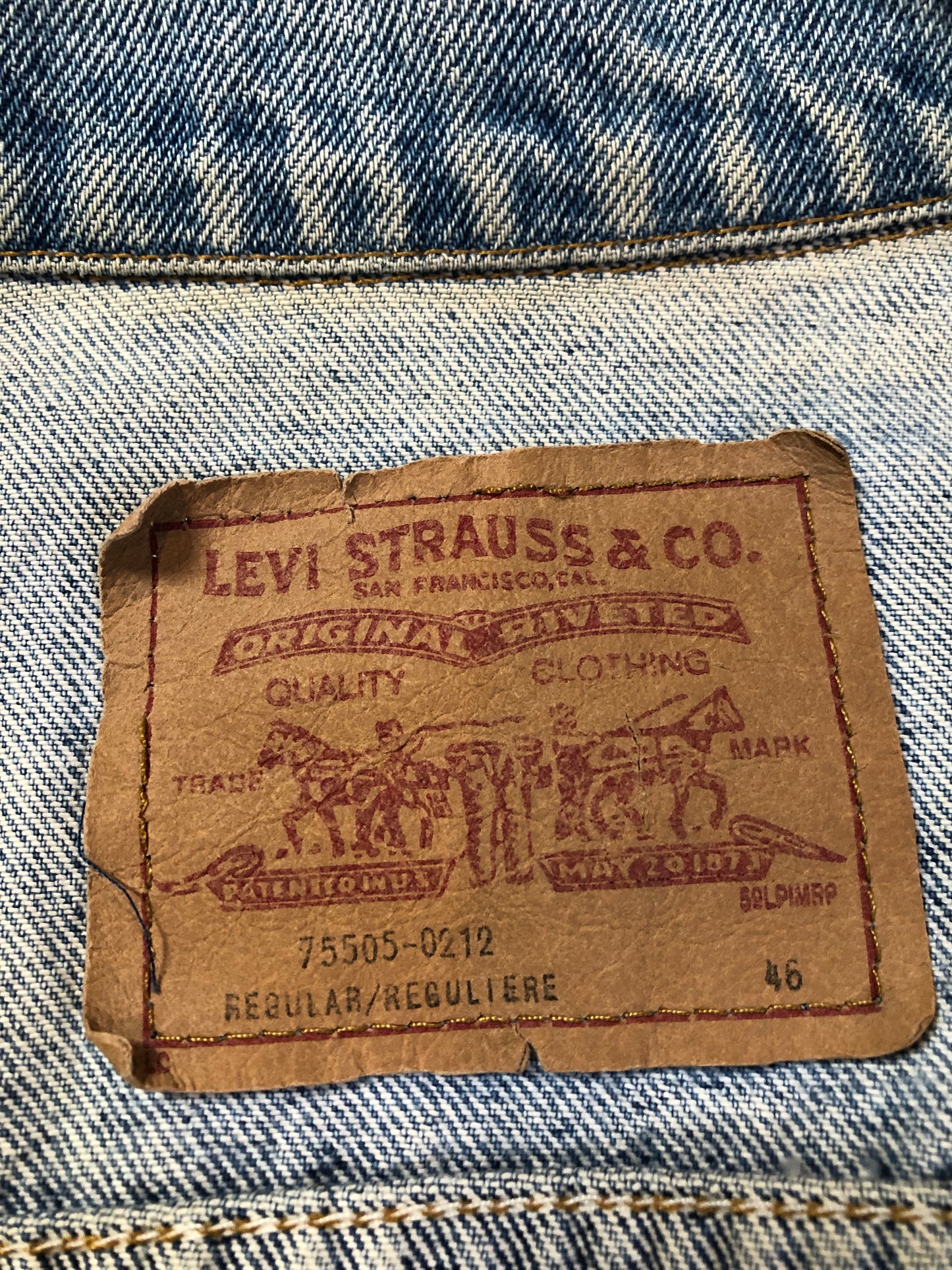 Vintage 1970’s Levi’s light wash denim trucker jacket with button closures and two flap pockets on the chest. Orange Tab, 100% cotton, made in Canada, size 46 - Kingspier Vintage