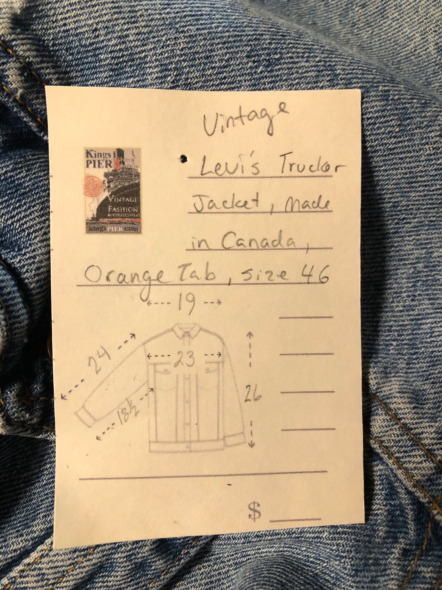 Vintage 1970’s Levi’s light wash denim trucker jacket with button closures and two flap pockets on the chest. Orange Tab, 100% cotton, made in Canada, size 46 - Kingspier Vintage
