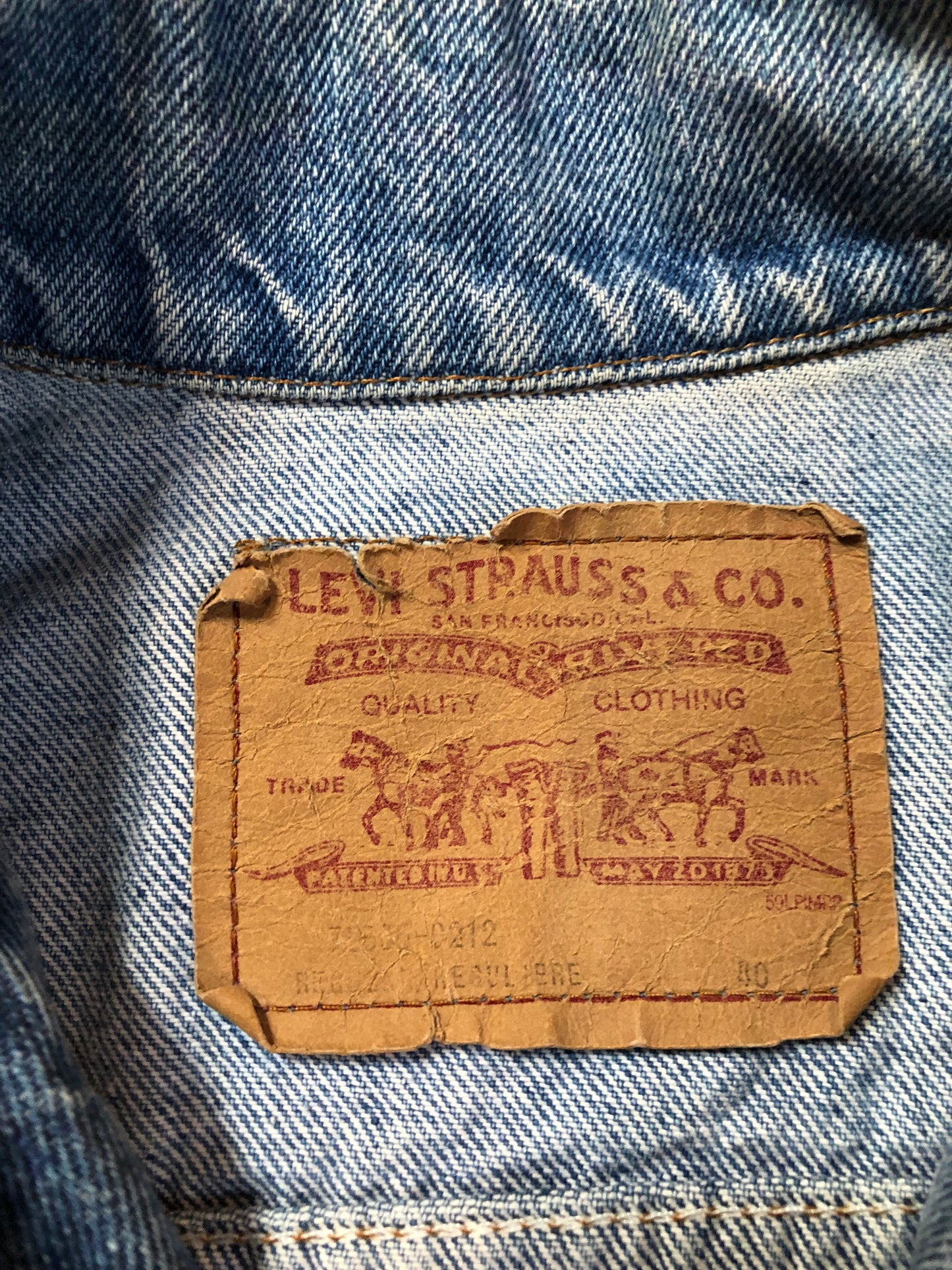 Vintage 1970’s Levi’s light wash denim trucker jacket with button closures and two flap pockets on the chest. Orange Tab, 100% cotton, made in Canada, size 40 - Kingspier Vintage