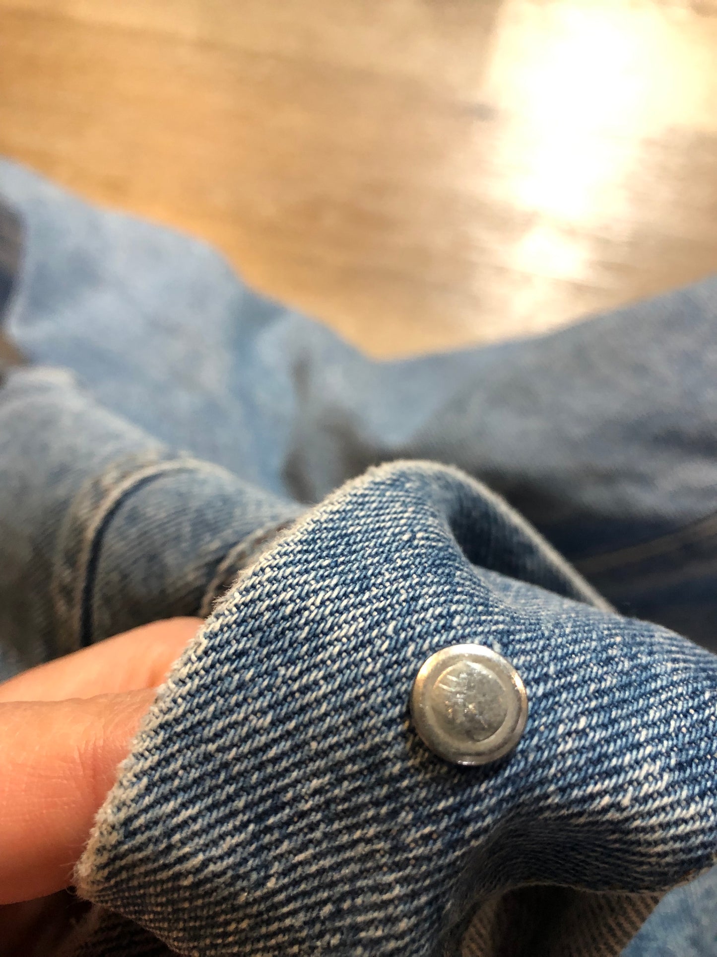 Vintage 1970’s Levi’s light wash denim trucker jacket with button closures and two flap pockets on the chest. Orange Tab, 100% cotton, made in Canada, size 40 - Kingspier Vintage