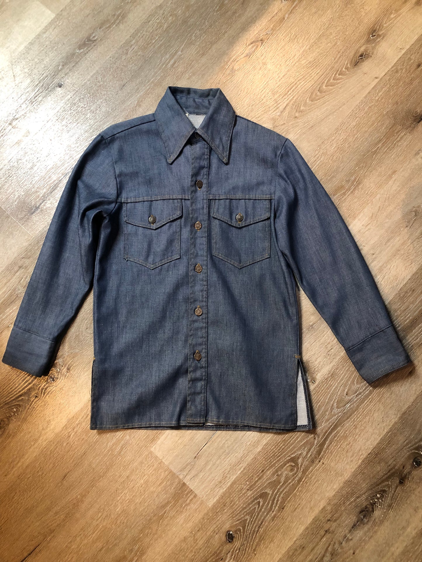Vintage Bar C Authentic Western medium wash denim shirt jacket with button closures, two flap pockets on the chest and a custom rose design embroidered on the back. Made in USA, size med/ large - Kingspier Vintage