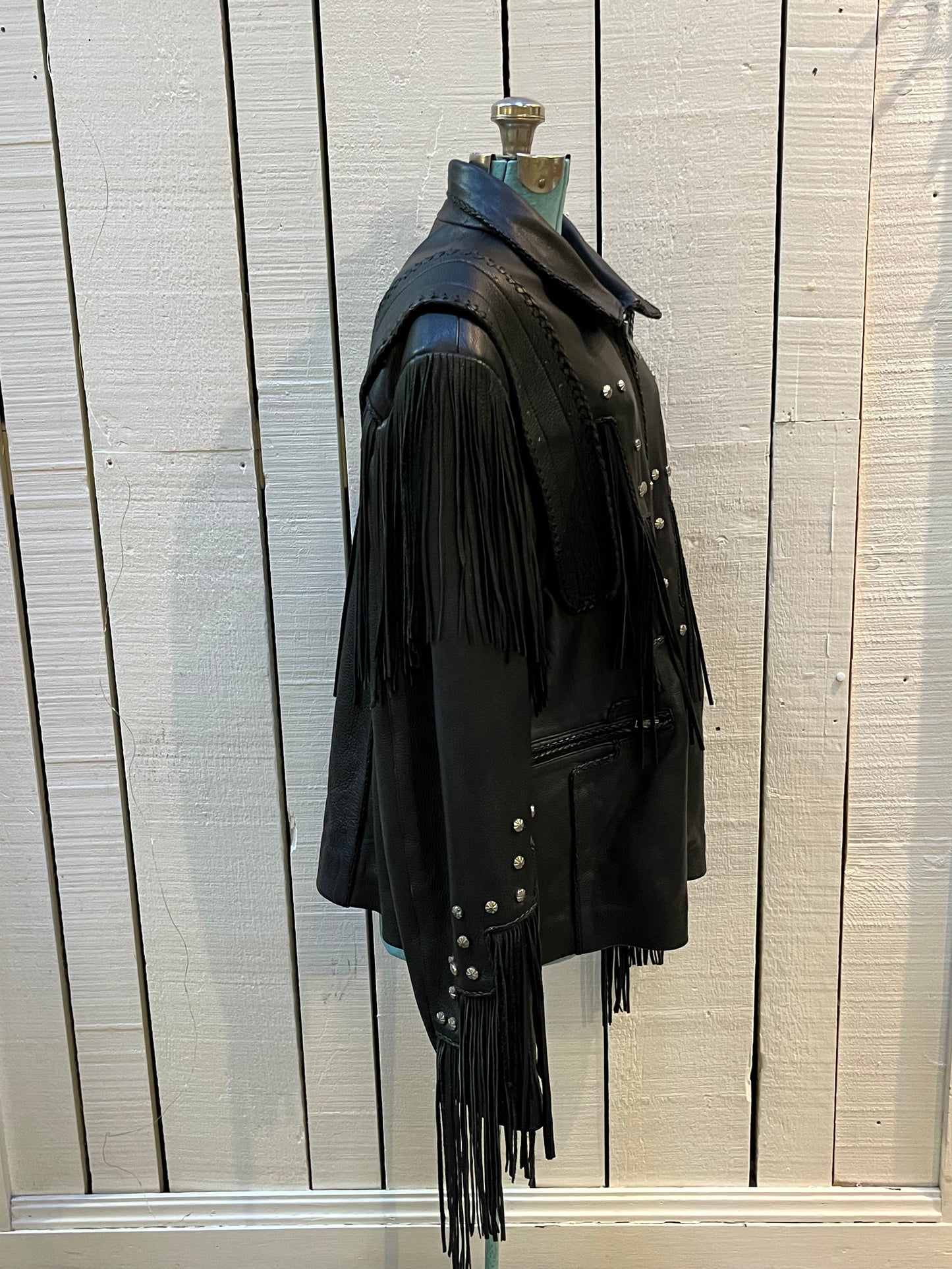 Rare authentic vintage leather jacket with fringe once owned by Johnny Cash. Consigned by a former member of Johnny Cash’s band from 1987-1990.
The piece features zipper closure, zip pockets, leather fringe and stud details
Chest 52”