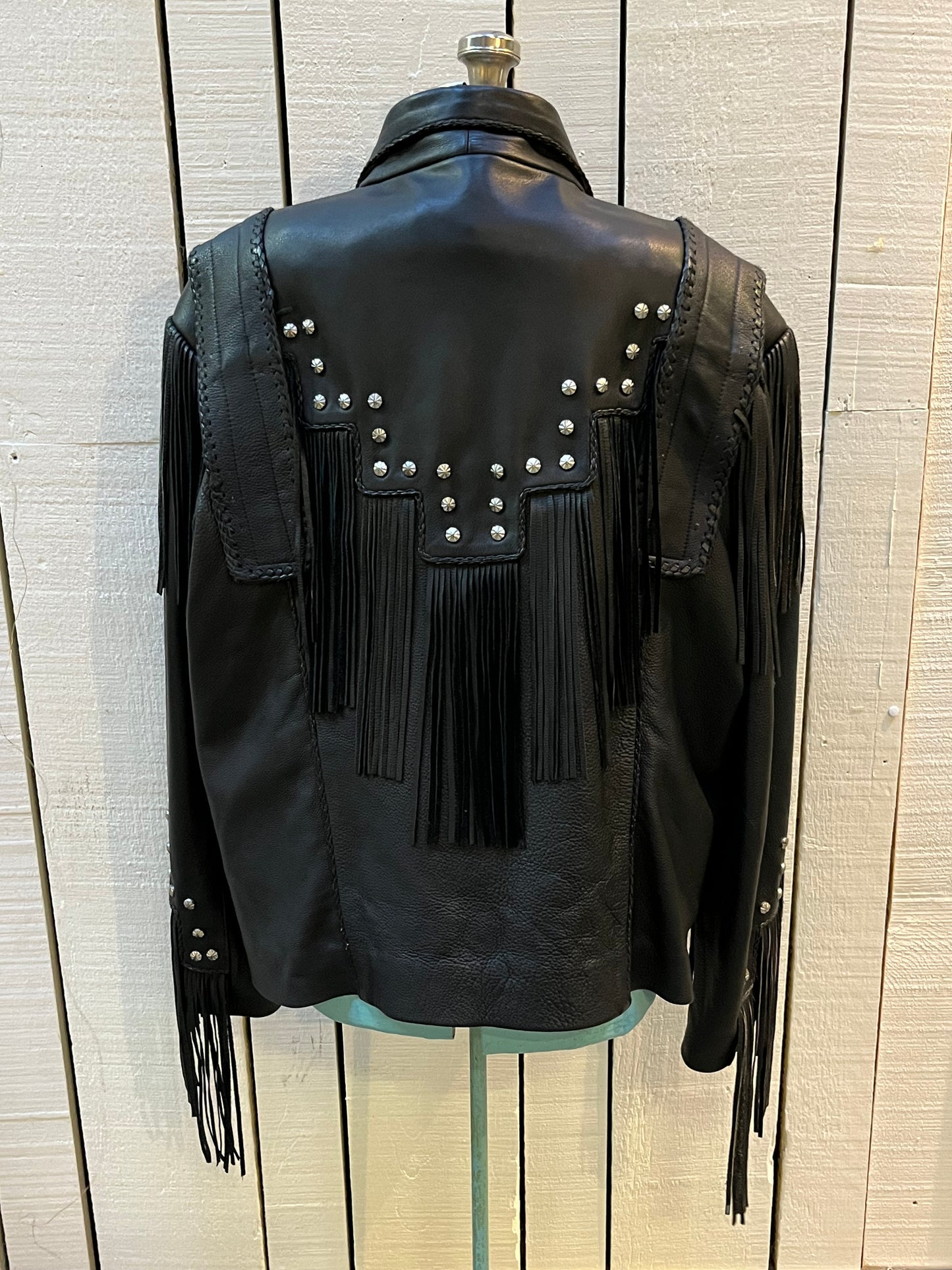 Rare authentic vintage leather jacket with fringe once owned by Johnny Cash. Consigned by a former member of Johnny Cash’s band from 1987-1990.
The piece features zipper closure, zip pockets, leather fringe and stud details
Chest 52”