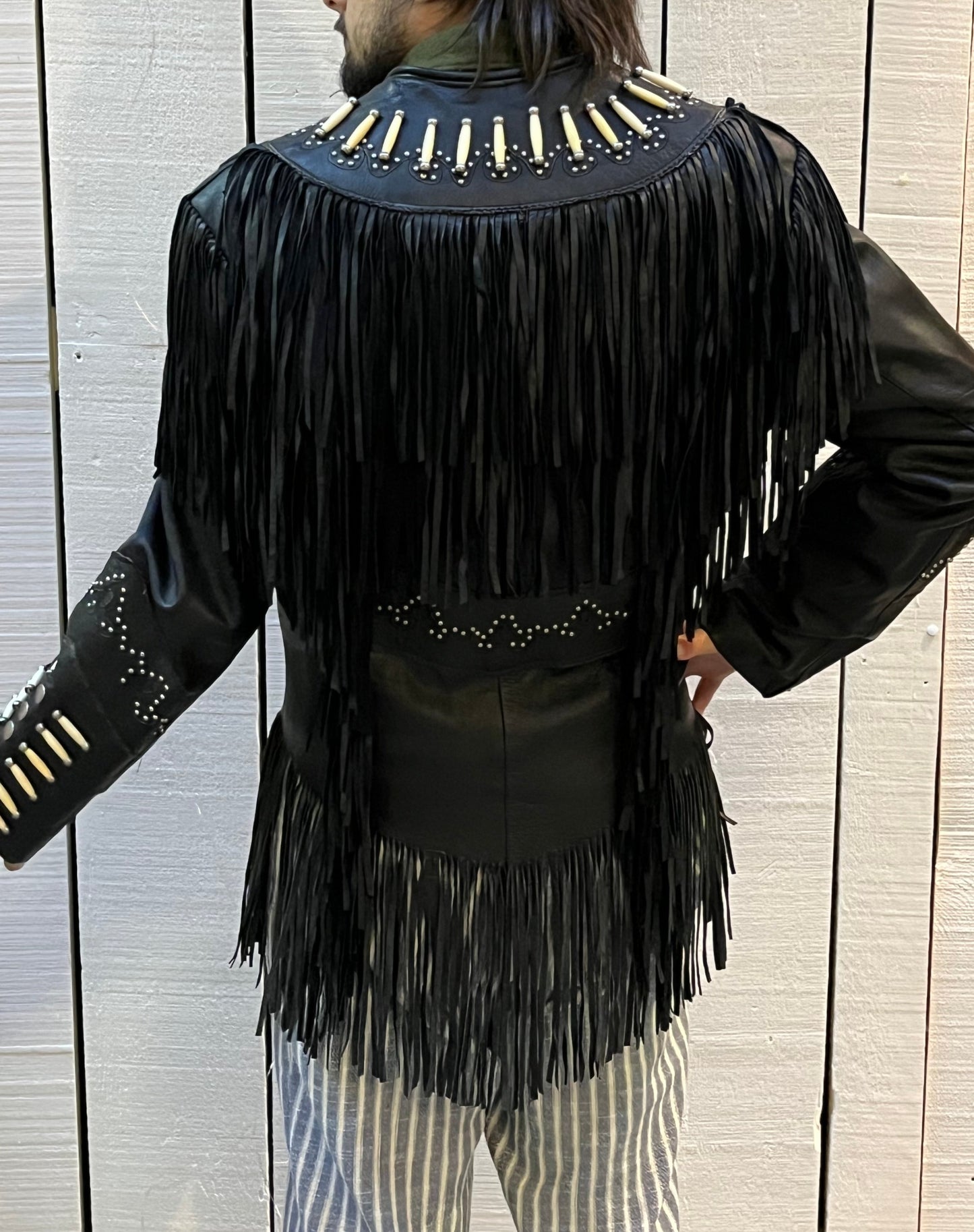 Rare authentic vintage leather jacket with fringe once owned by June Carter. Consigned by a former member of Johnny Cash’s band from 1987-1990.
The Western World by Shaf jacket features snap closures, leather fringe, beaded and stud details.
Size Medium