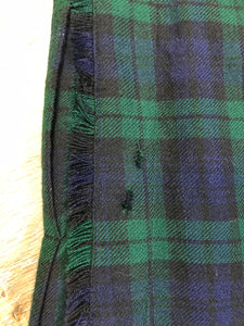 Kingspier Vintage - Black Watch tartan kilt with leather straps on each side to adjust size and fringed top skirt. Kilt is partially lined. Fibres unknown.
