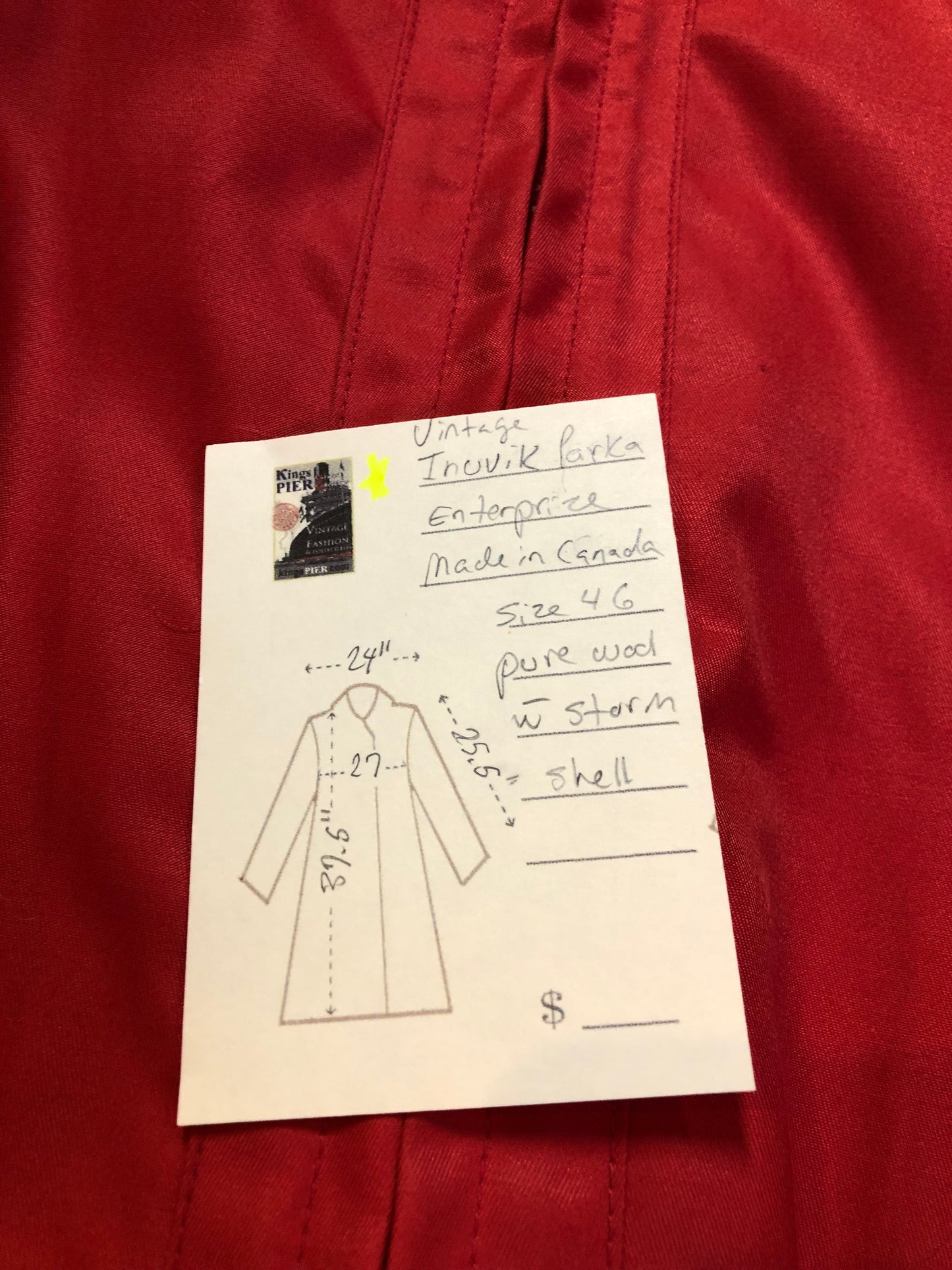 Vintage Inuvik Parka Enterprise red 100% pure wool northern parka. This parka features a cotton/ polyester blend storm shell with embroidered details, a fur trimmed hood, zipper closure, patch pockets, satin lining and a northern fishing design in felt applique. Made in northern Canada. Size 46 - Kingspier Vintage