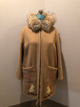 Load image into Gallery viewer, Vintage Inuvik Sewing Company brown 100% pure wool parka.  This parka features a cotton/ polyester blend storm shell with embroidered details, a fur trimmed hood, zipper closure, patch pockets, satin lining and a snowshoeing design in felt applique. Made in northern Canada - Kingspier Vintage
