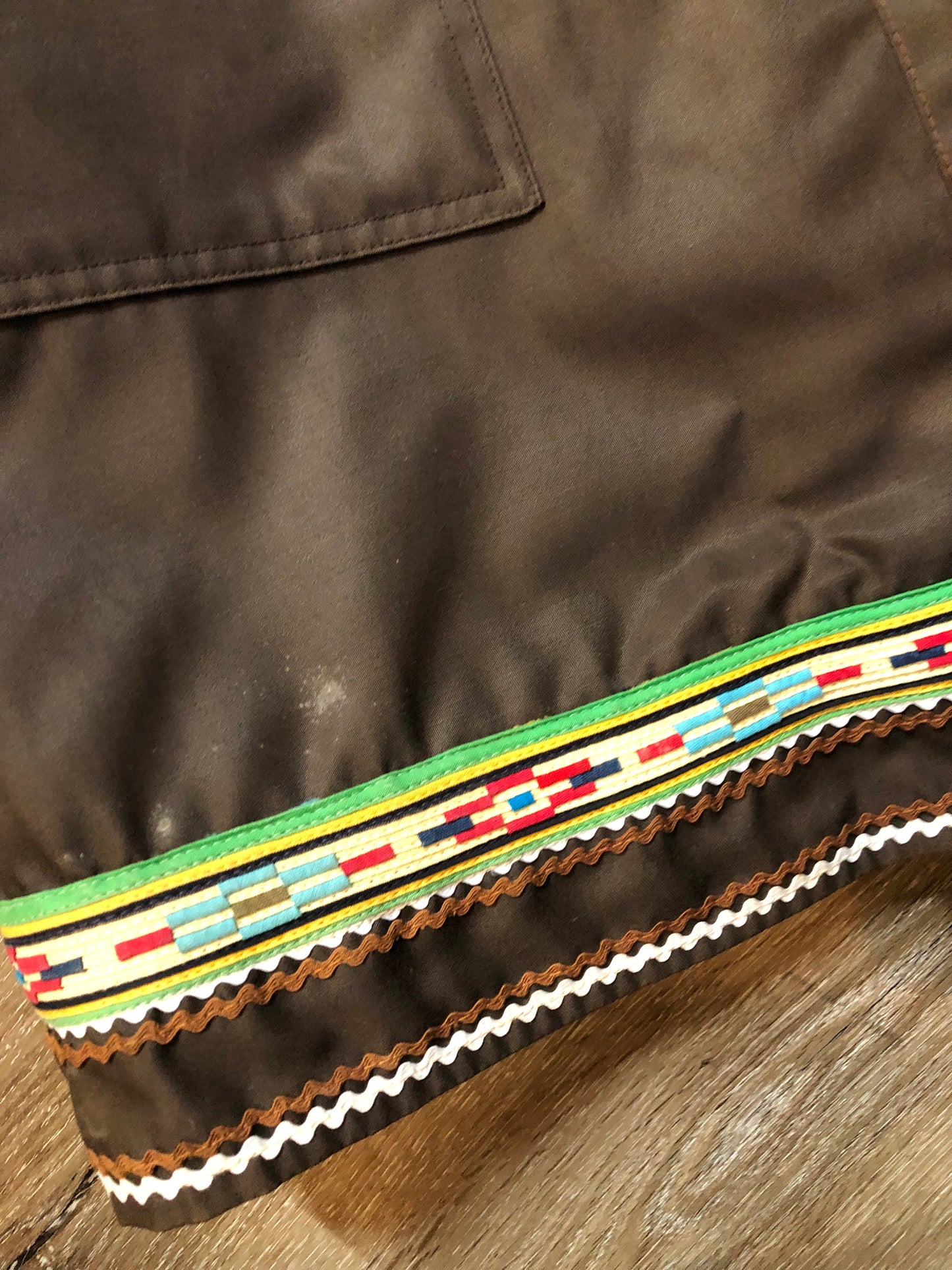 Vintage Inuvik Sewing Company brown 100% pure wool parka. This parka features a cotton/ polyester blend storm shell with embroidered details, a fur trimmed hood, zipper closure, patch pockets, satin lining and a snowshoeing design in felt applique. Made in northern Canada - Kingspier Vintage