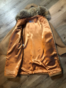 Vintage Inuvik Sewing Company brown 100% pure wool parka.  This parka features a cotton/ polyester blend storm shell with embroidered details, a fur trimmed hood, zipper closure, patch pockets, satin lining and a snowshoeing design in felt applique. Made in northern Canada - Kingspier Vintage
