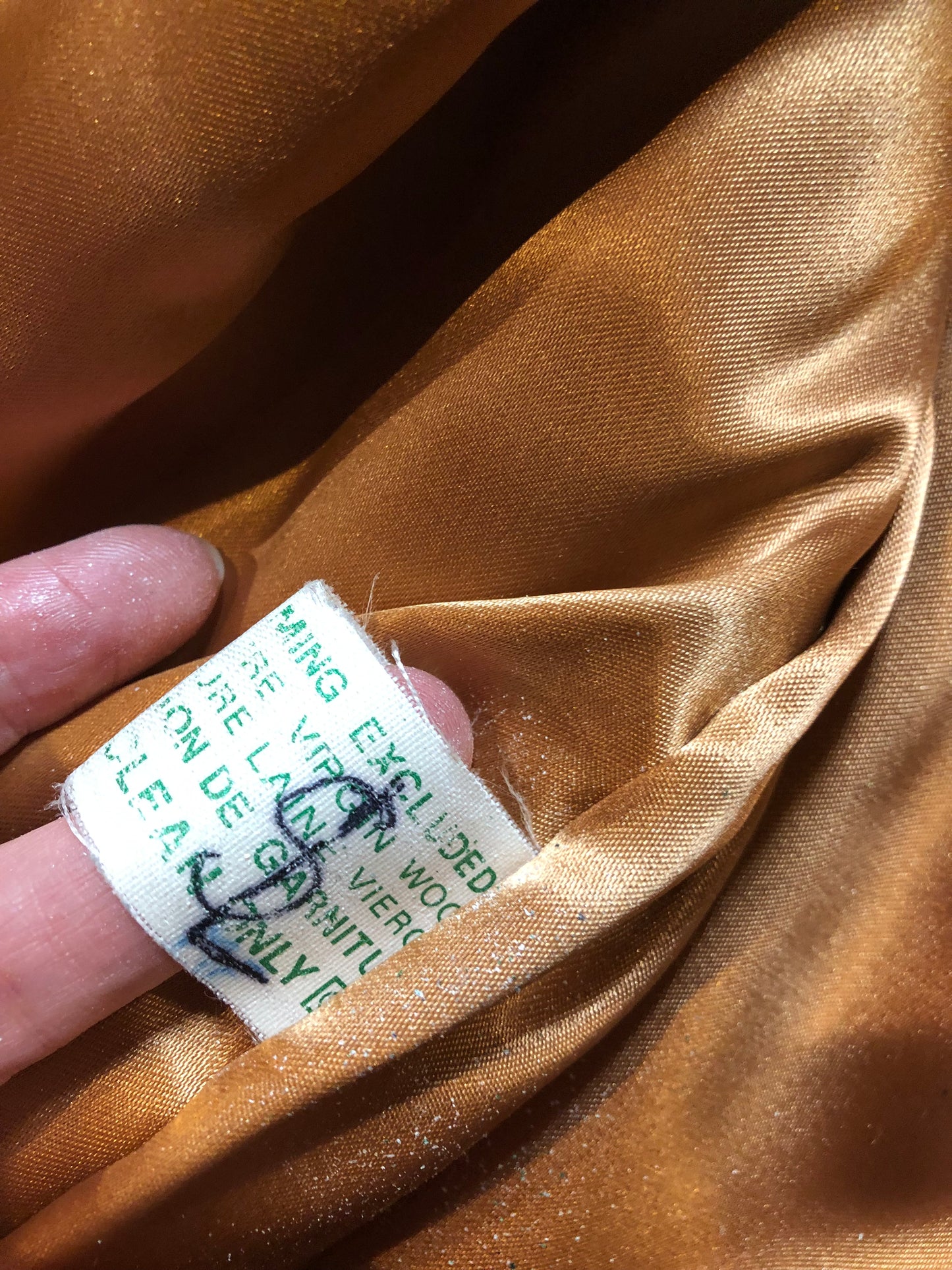Vintage Inuvik Sewing Company brown 100% pure wool parka. This parka features a cotton/ polyester blend storm shell with embroidered details, a fur trimmed hood, zipper closure, patch pockets, satin lining and a snowshoeing design in felt applique. Made in northern Canada - Kingspier Vintage