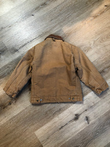 Kingspier Vintage - Kids Carhartt Chore Jacket in Tan Brown with Brown corduroy collar, zipper closure, slash pockets, knit inner cuffs and red quilted lining. Made in the USA. Size childrens 6.