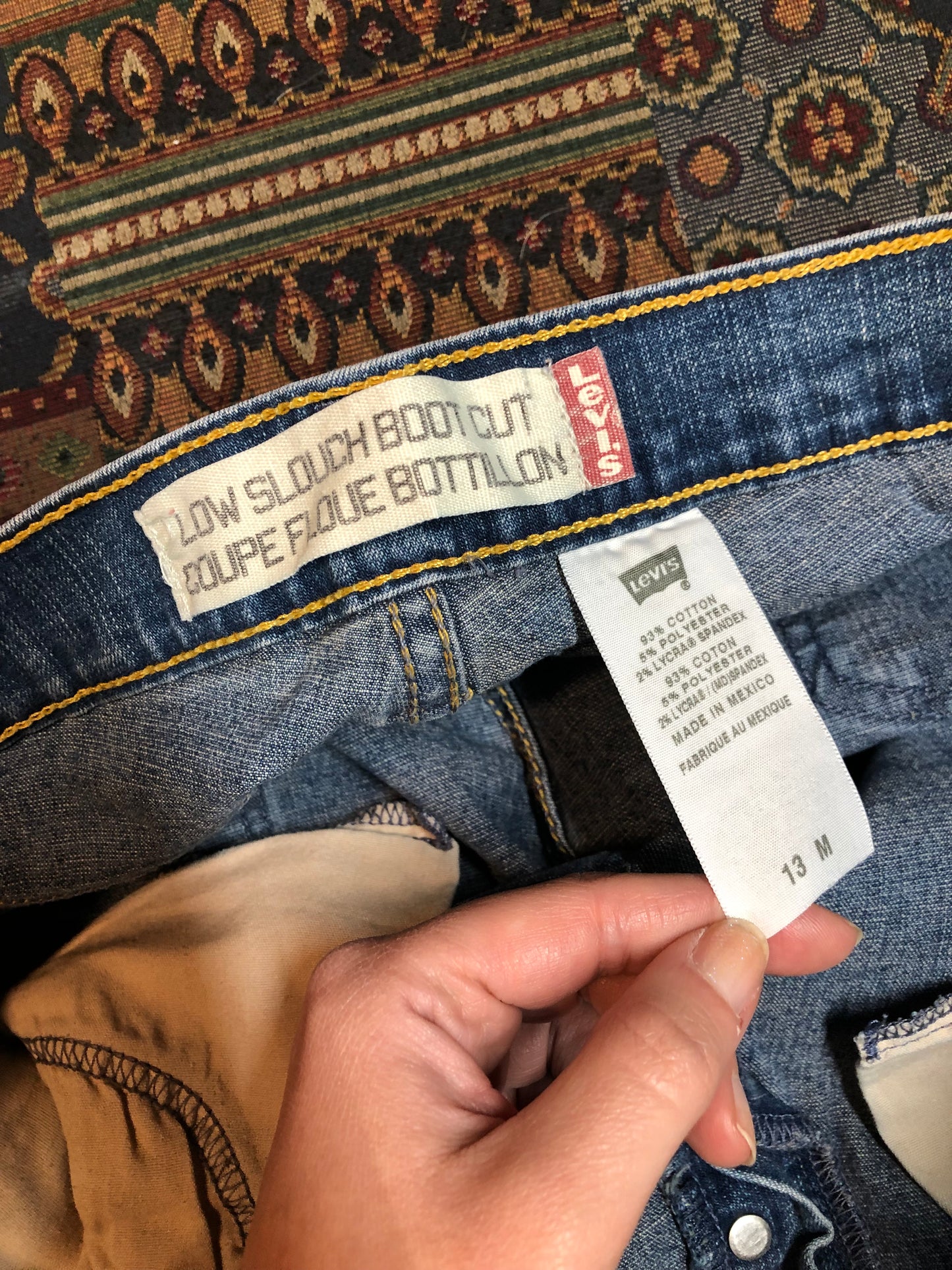 Vintage Levi’s Low Slouch Boot Cut Denim Jeans Red tab Low rise Button fly Boot cut leg. 93% Cotton/ 5% Polyester/ 2% Lycra Medium wash Made in Mexico - Kingspier Vintage