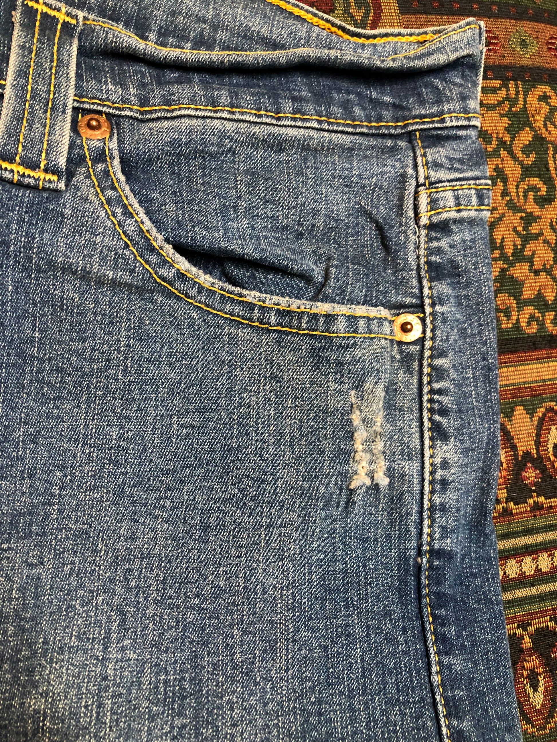 Vintage Levi’s Low Slouch Boot Cut Denim Jeans  Red tab  Low rise  Button fly  Boot cut leg.  93% Cotton/ 5% Polyester/ 2% Lycra  Medium wash  Made in Mexico - Kingspier Vintage
