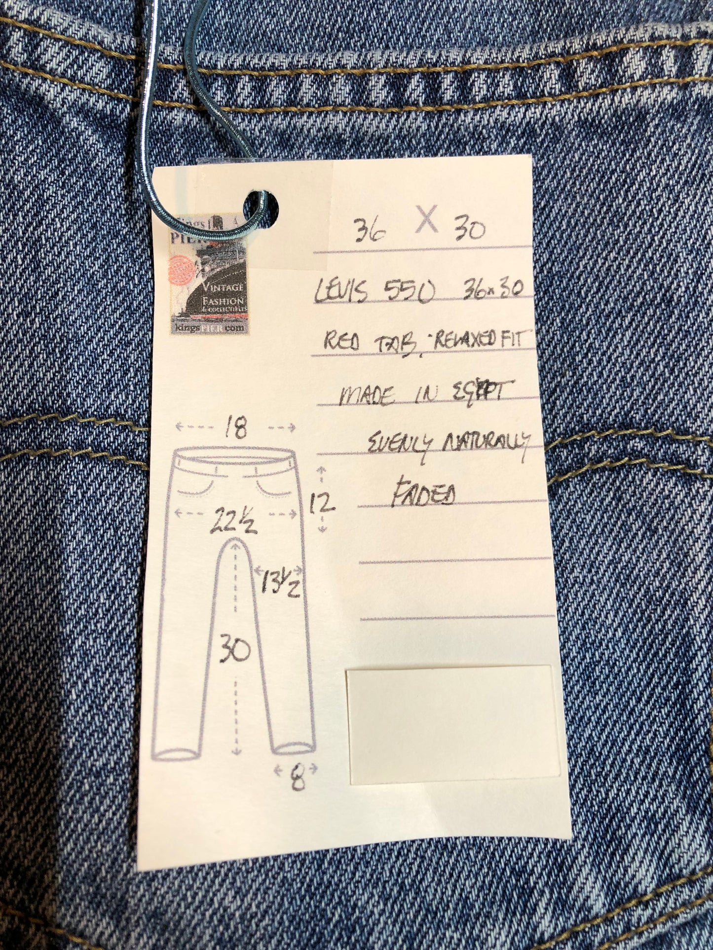 Levi’s 550 - 36”x30” Denim Jeans Relaxed fit Red tab High rise Button fly Tapered leg Lighter wash 100% cotton Made in Egypt - Kingspier Vintage