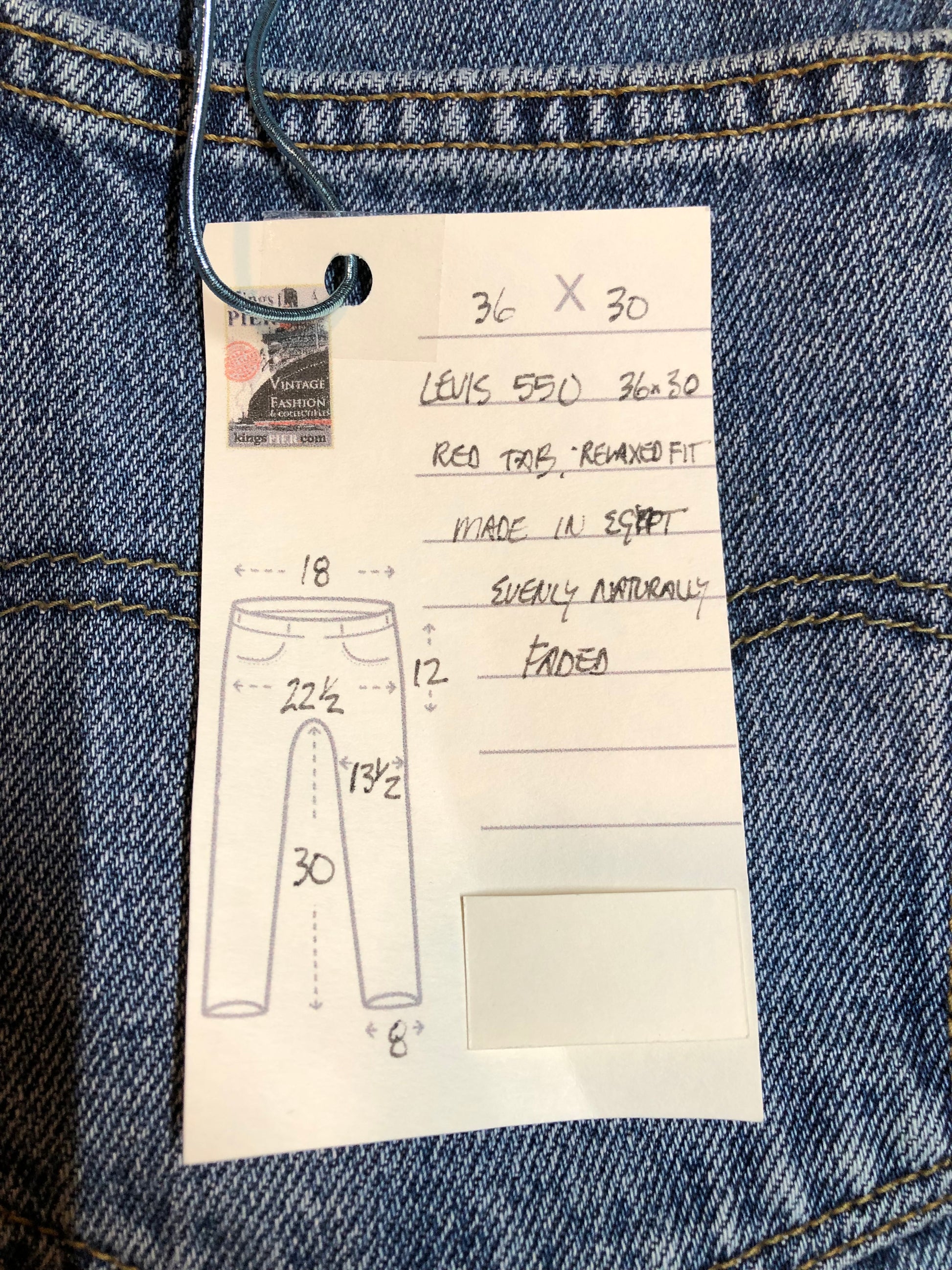 Levi’s 550 - 36”x30” Denim Jeans  Relaxed fit  Red tab  High rise  Button fly  Tapered leg  Lighter wash  100% cotton  Made in Egypt - Kingspier Vintage
