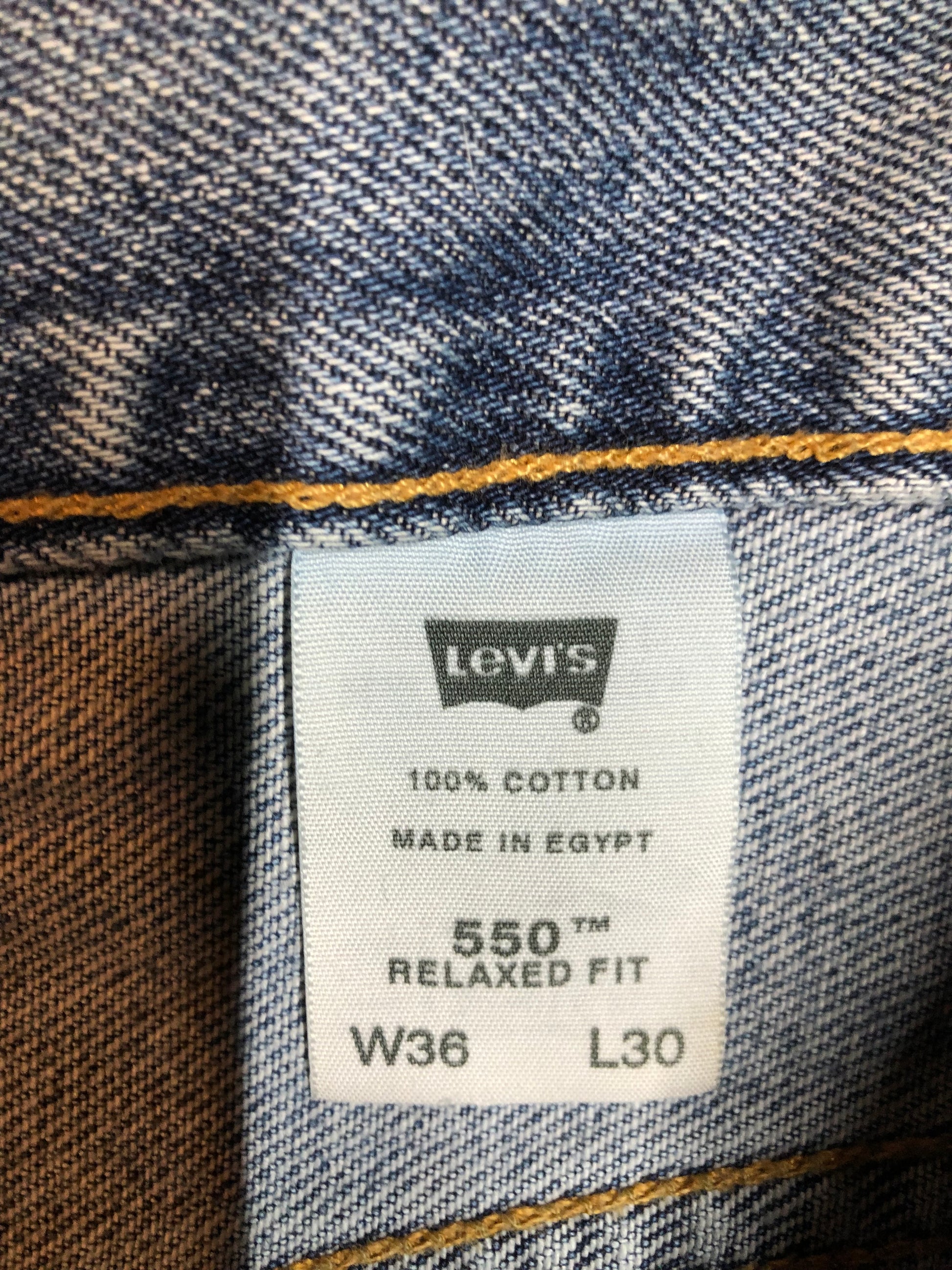 Levi’s 550 - 36”x30” Denim Jeans  Relaxed fit  Red tab  High rise  Button fly  Tapered leg  Lighter wash  100% cotton  Made in Egypt - Kingspier Vintage