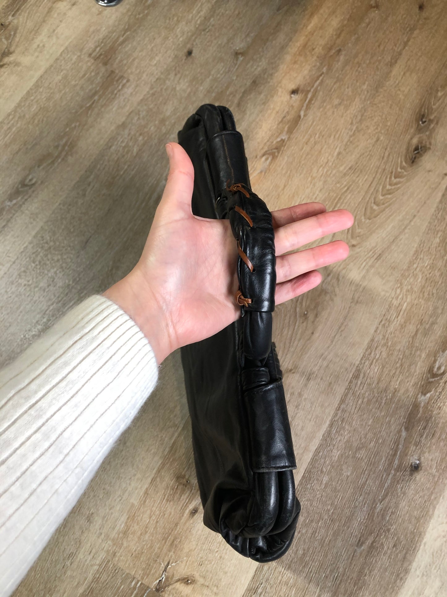 Kingspier Vintage - Upcycled leather bag with top handle, loops to attach a longer strap. (strap not included), snap closures, dinosaur and wooly mammoth design, a tassel and some other unique leather details.
Length - 18”
Width - 4”
Height - 13”
This bag is in great condition with some minor wear.