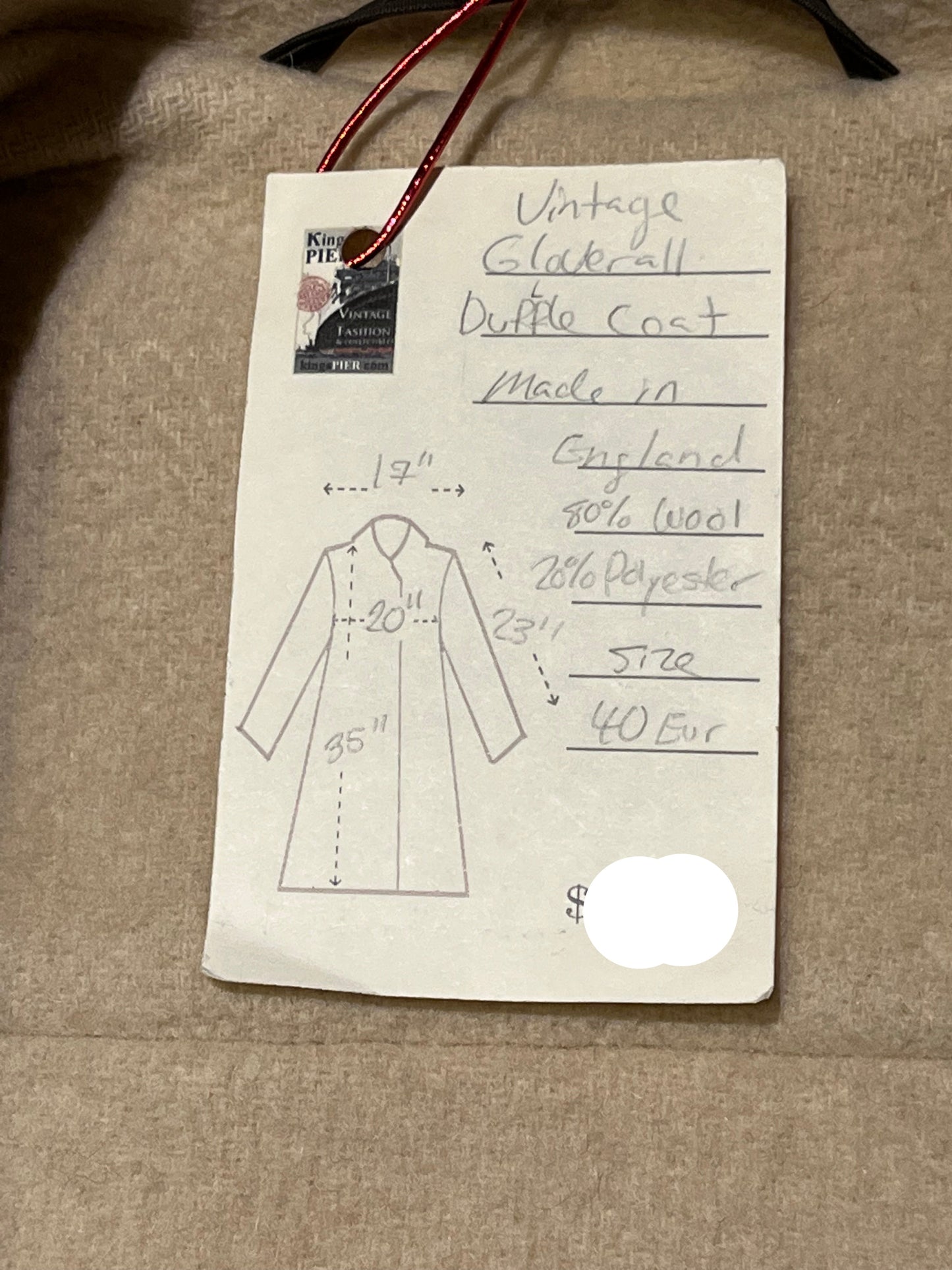 Vintage Gloverall tan duffle coat, with zipper and antler toggle closures, hood and two flap pockets.
80% wool/ 20% polyester
Made in England
Size 40