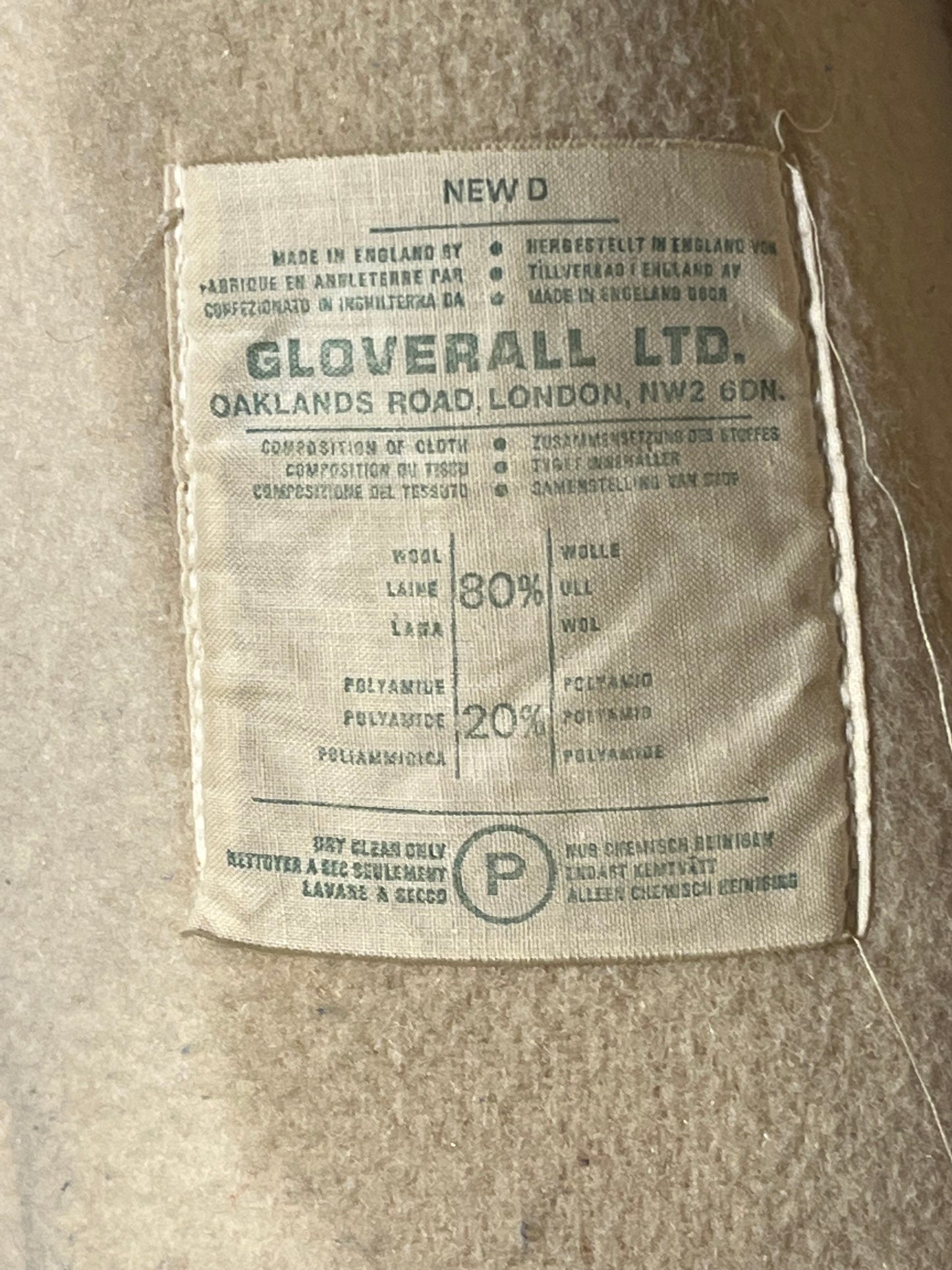 Vintage Gloverall tan duffle coat, with zipper and antler toggle closures, hood and two flap pockets.
80% wool/ 20% polyester
Made in England
Size 40