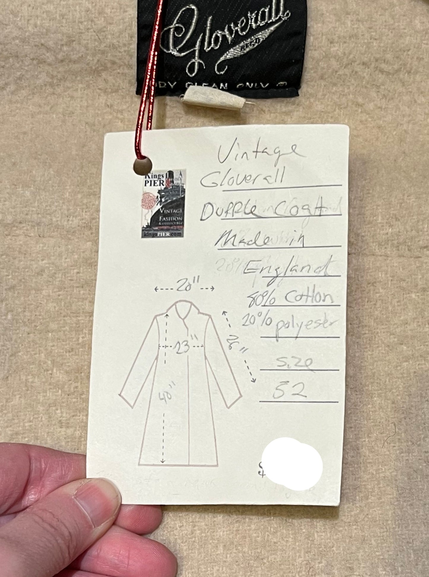 Vintage Gloverall tan duffle coat, with zipper and horn toggle closures, hood and two flap pockets.
80% wool/ 20% polyester
Made in England
Size 52